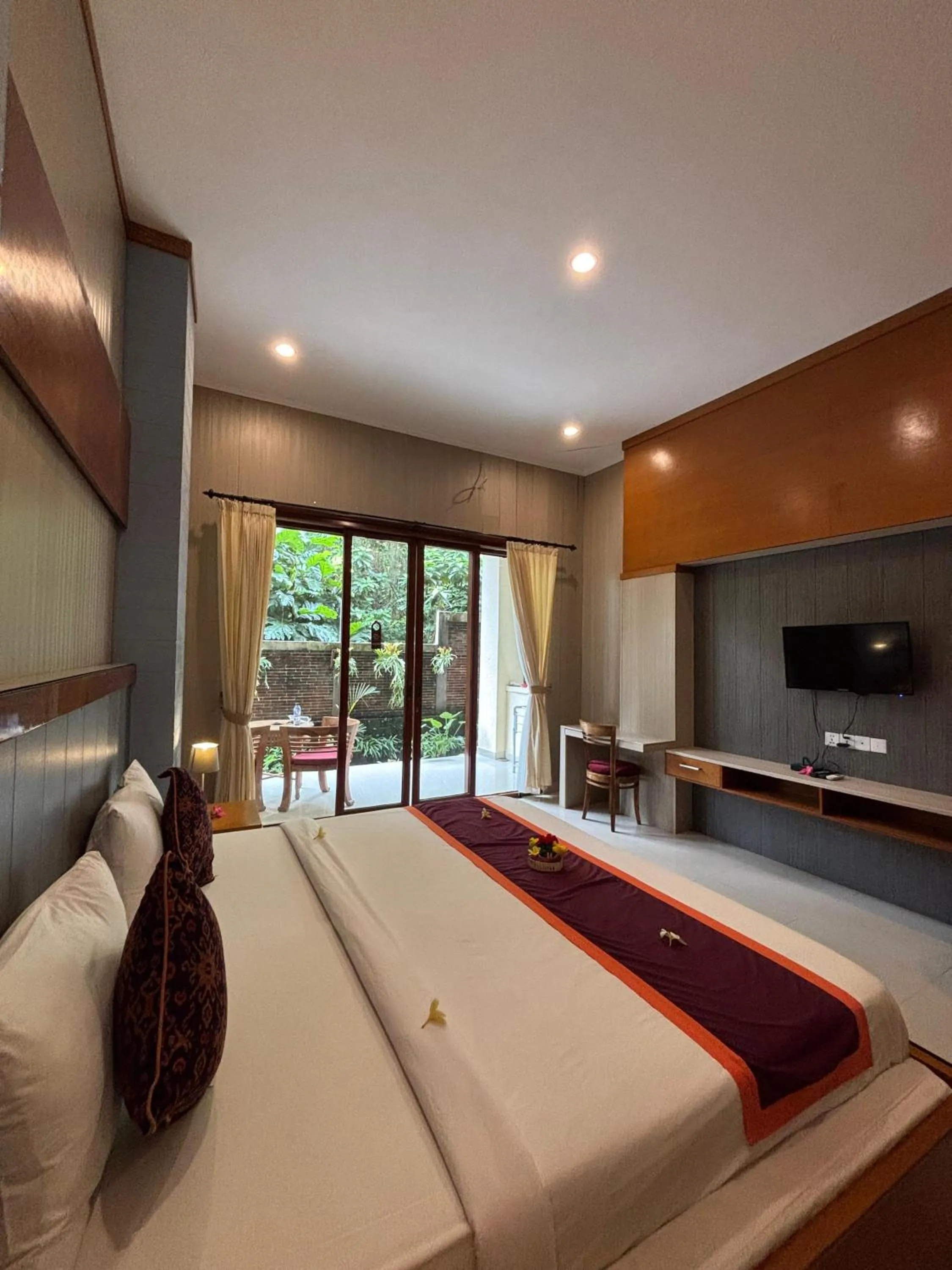 Bed in Adi Jaya Cottages Ubud Suites by EPS - CHSE Certified