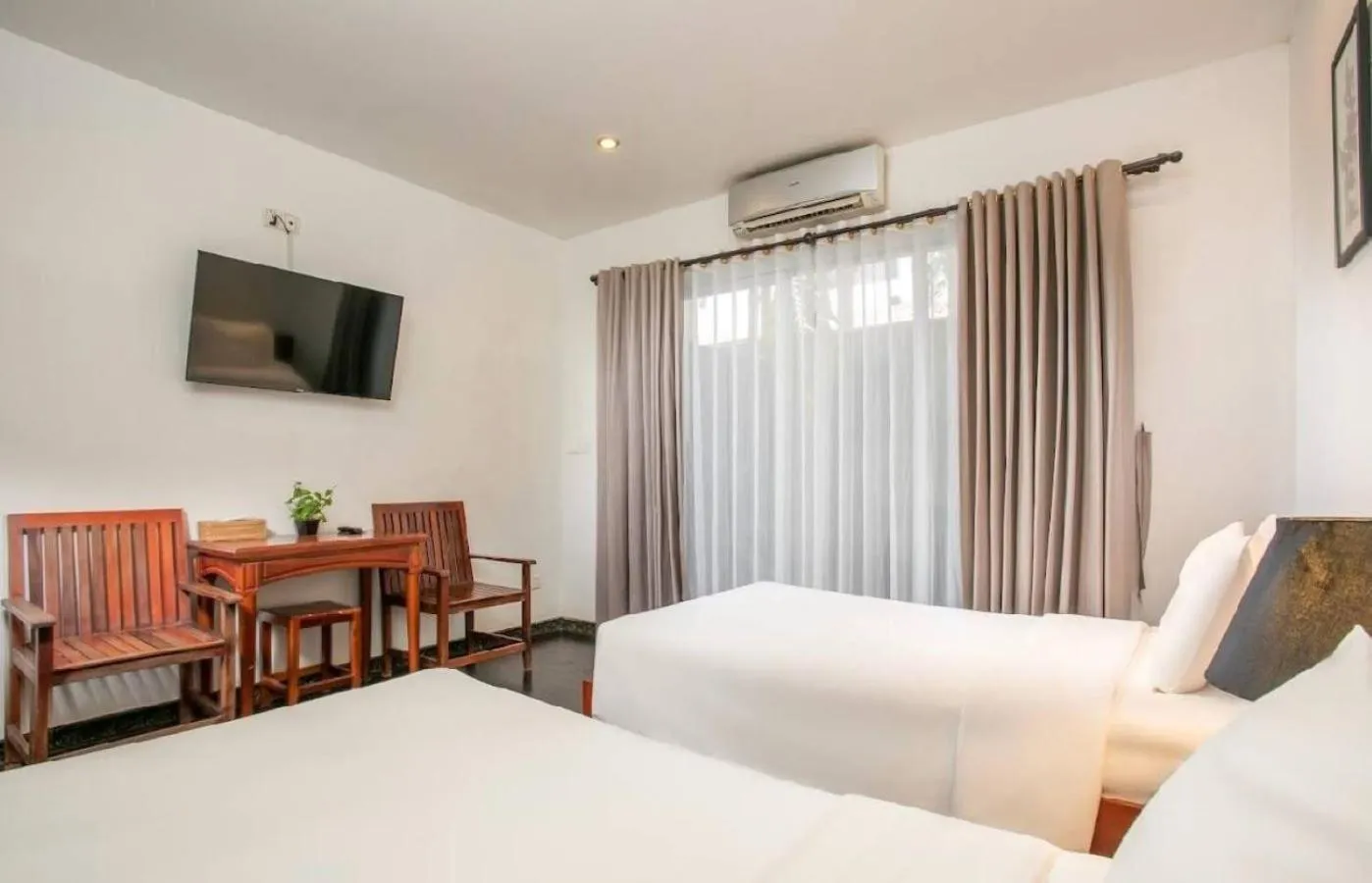 Bed in Apsara Centrepole Hotel