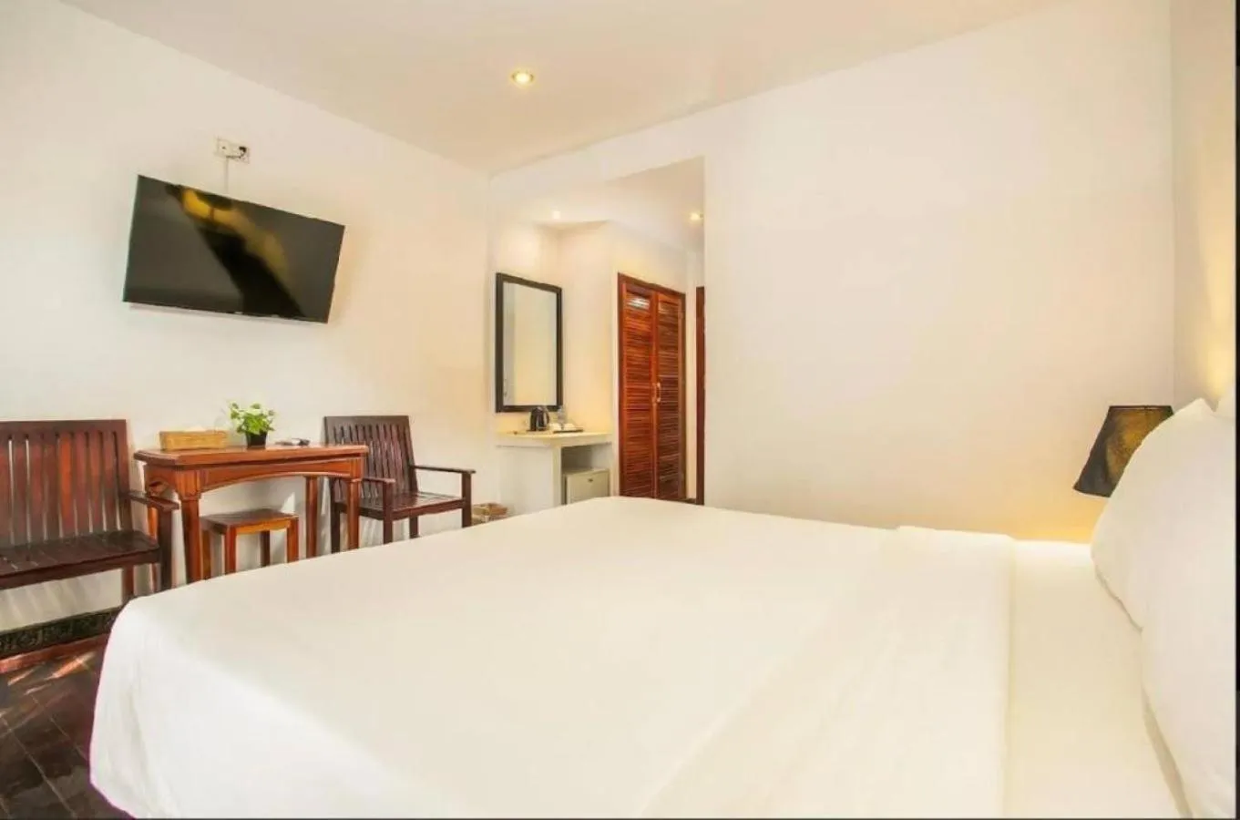 Bed in Apsara Centrepole Hotel