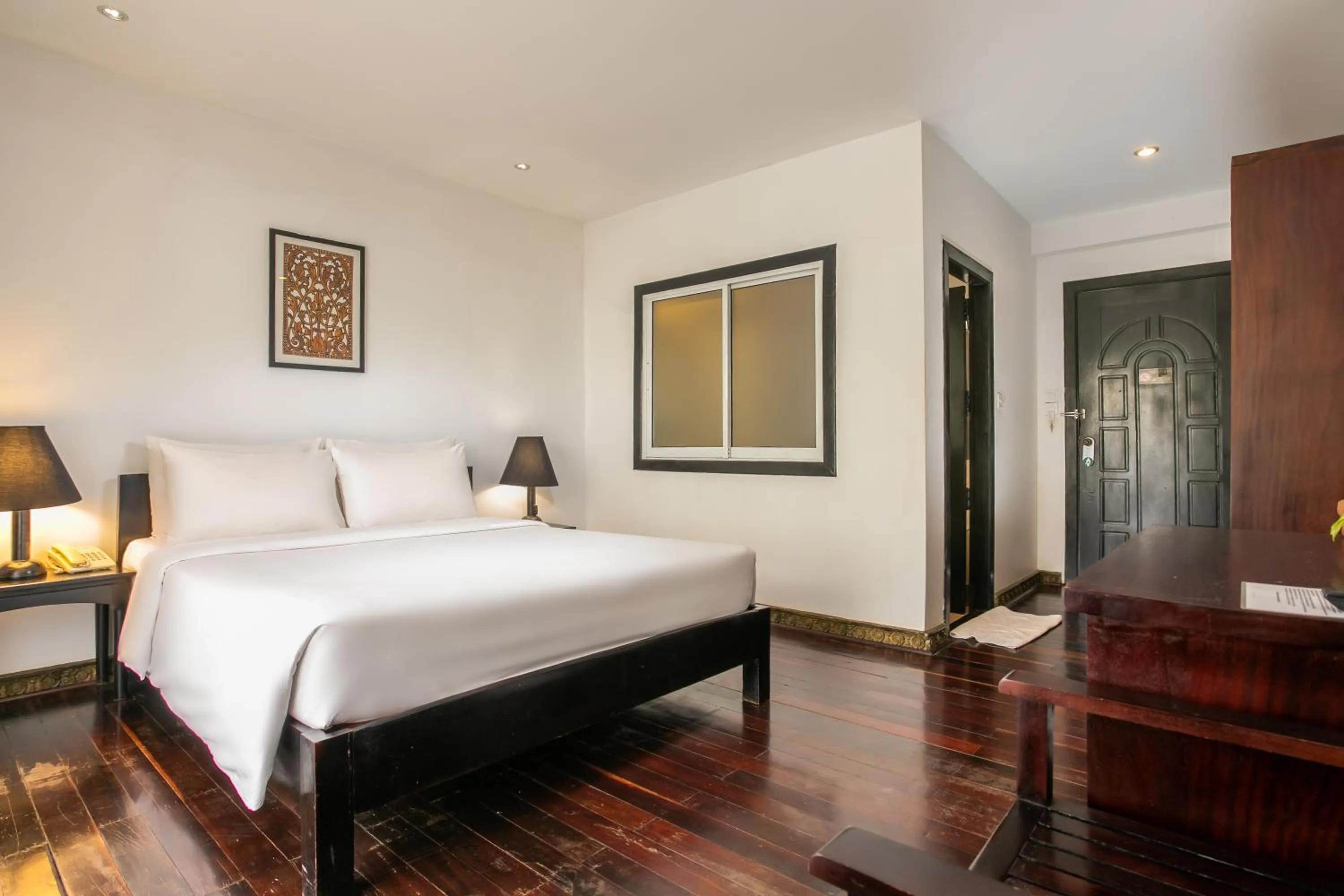 Bed in Apsara Centrepole Hotel