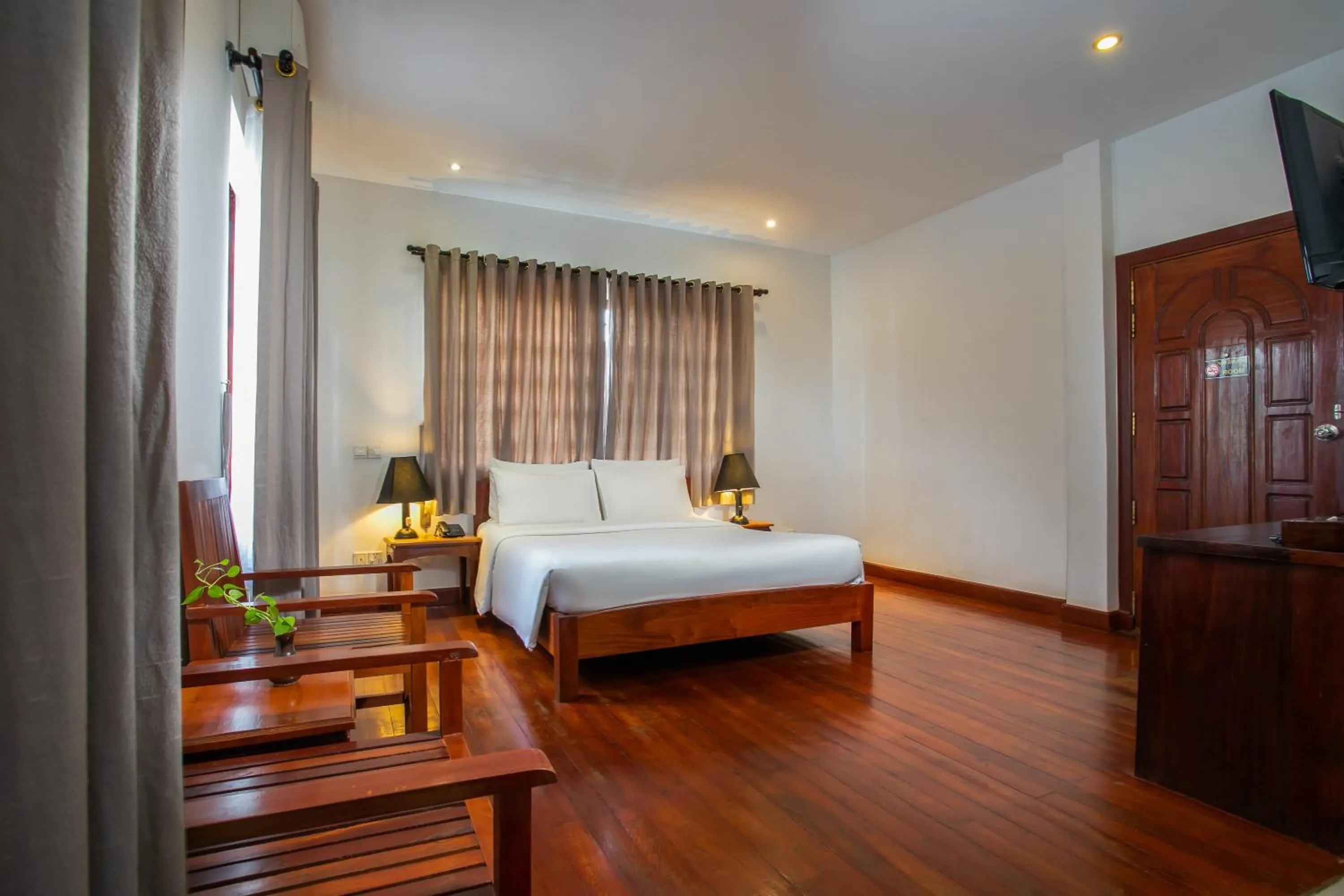 Bed in Apsara Centrepole Hotel
