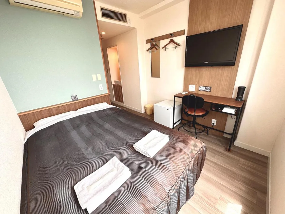 Bed in Tabist Tsukuba Sky Hotel