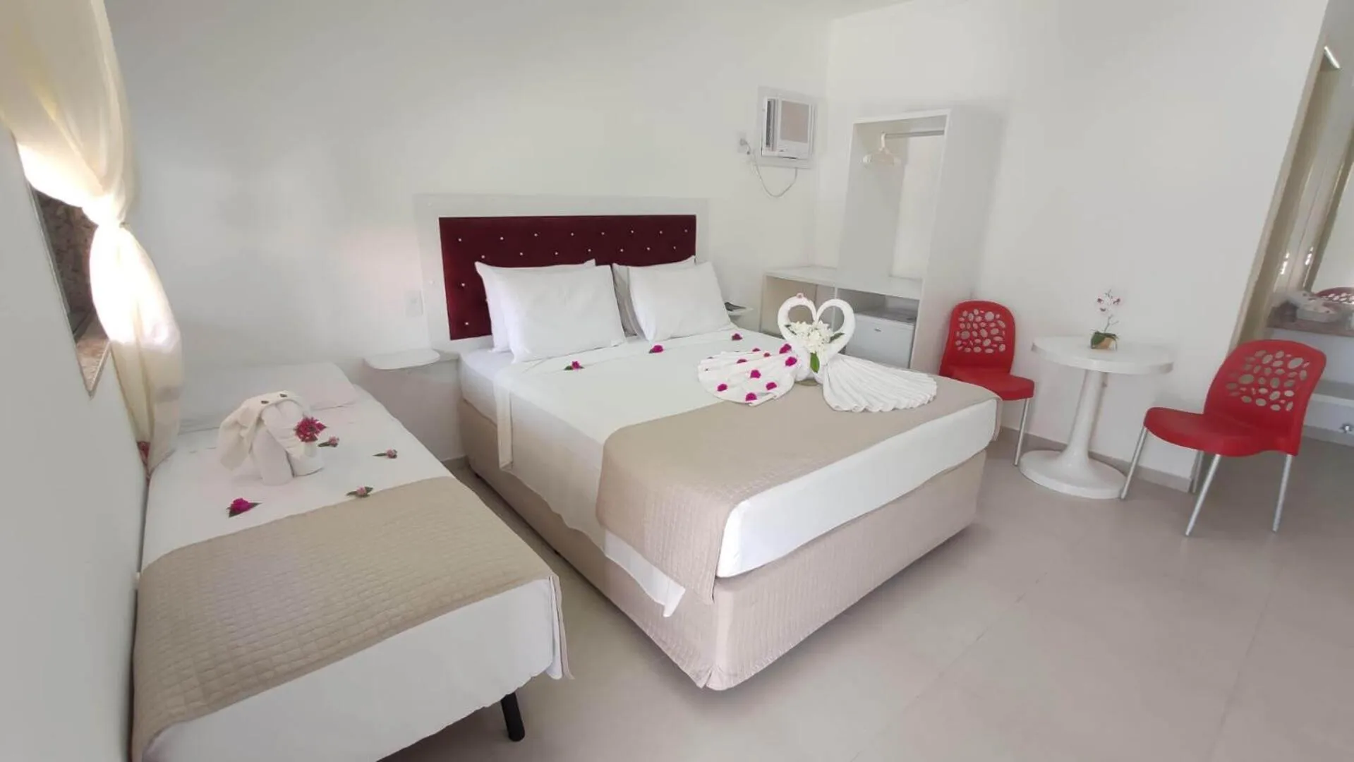 Bed in Pousada Polymar