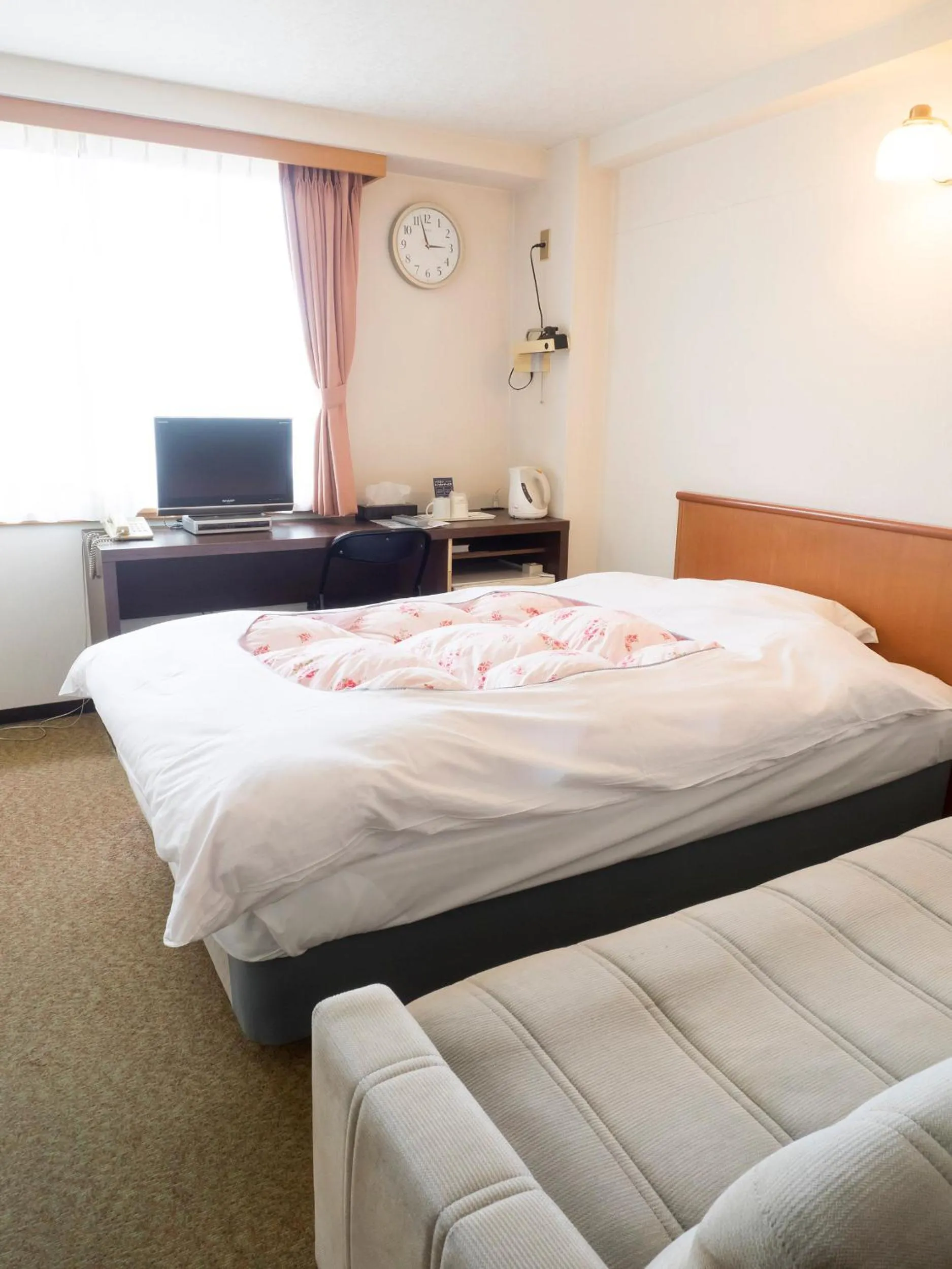 Bed in Hikone Station Hotel