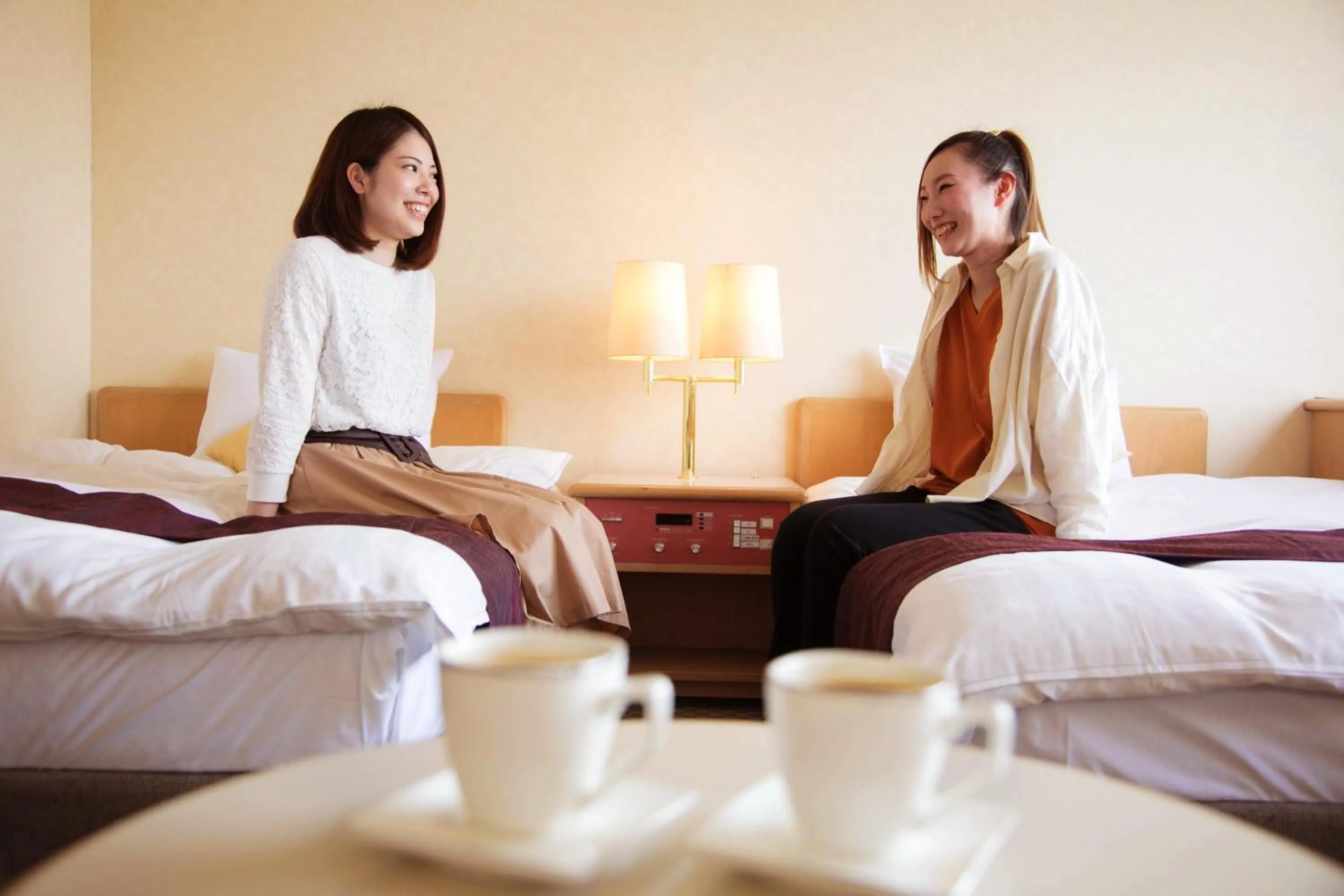group of guests, Bed in Mito Hotel Season