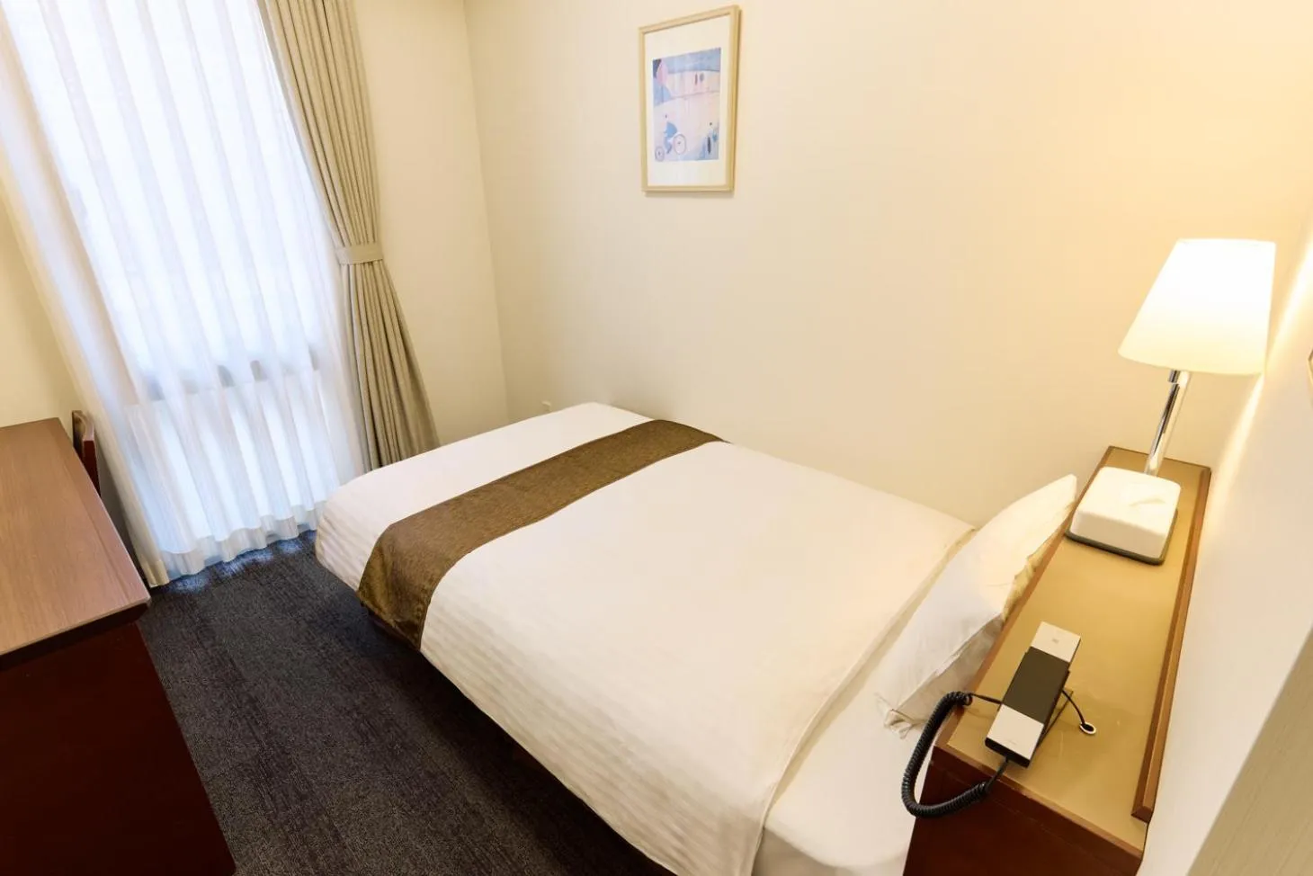 Bed in Ginza International Hotel