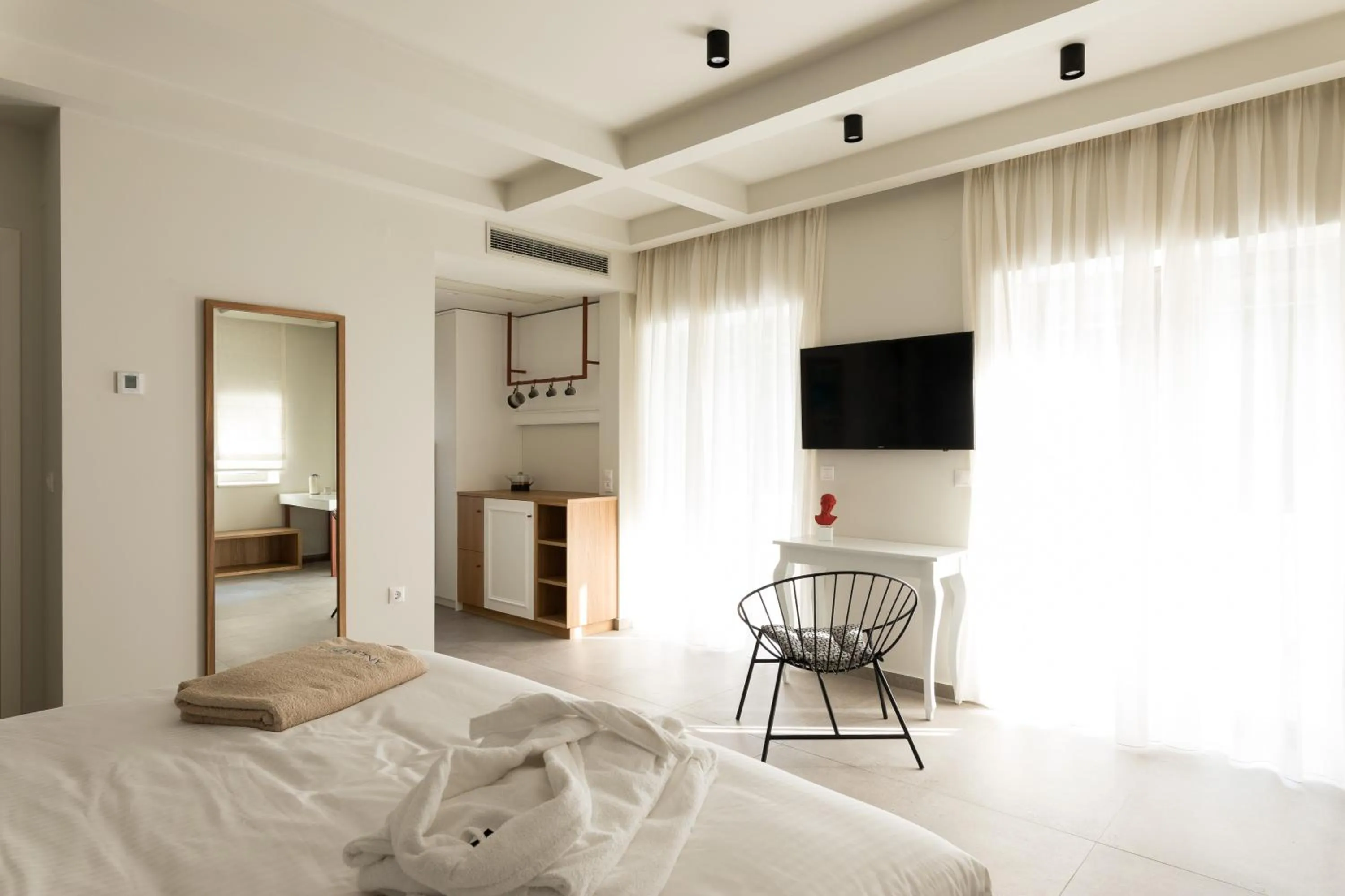 Bed in Anemolia Parga Suites