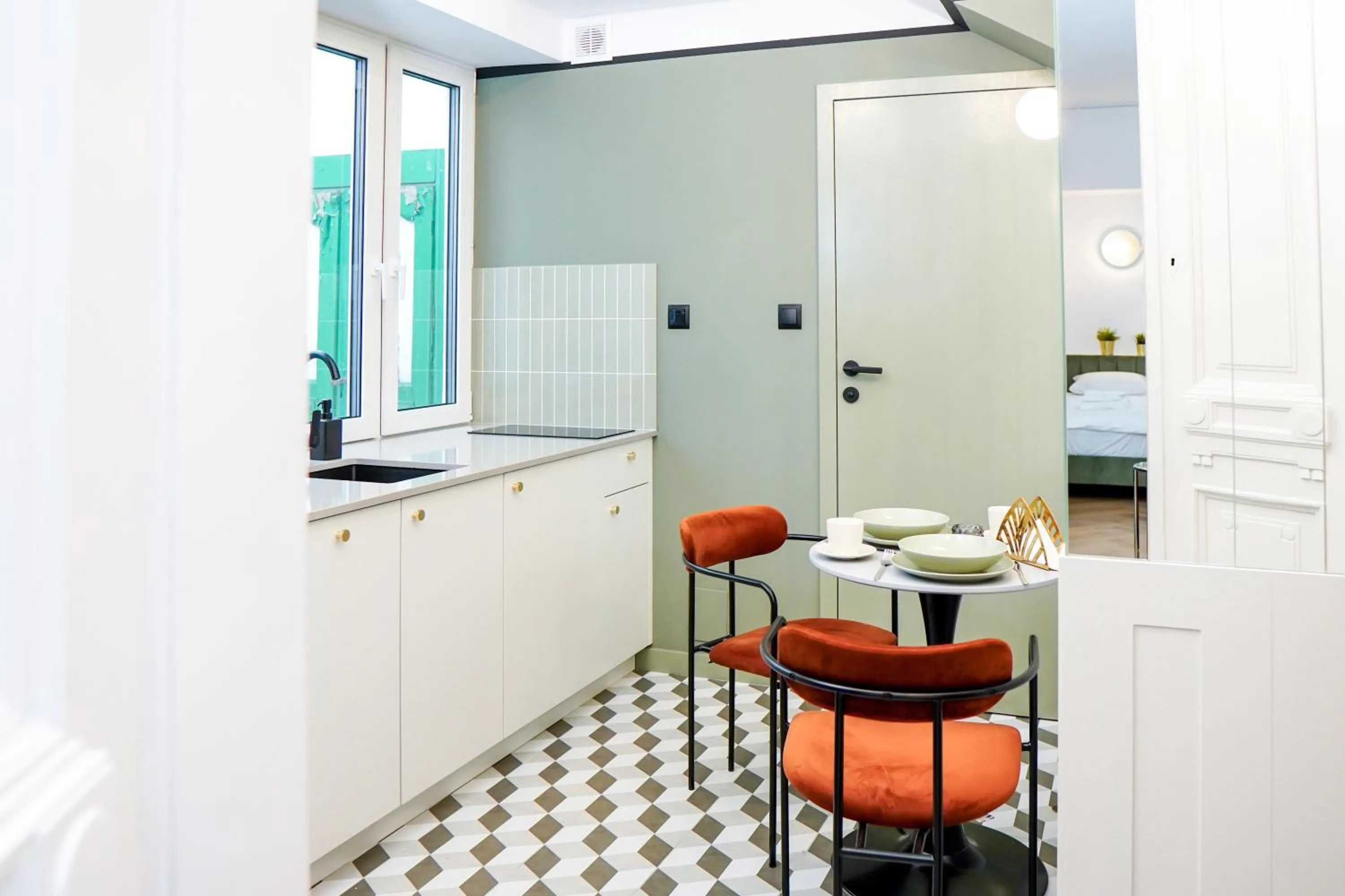 Kitchen or kitchenette in Aparthotel Nowy Świat 28