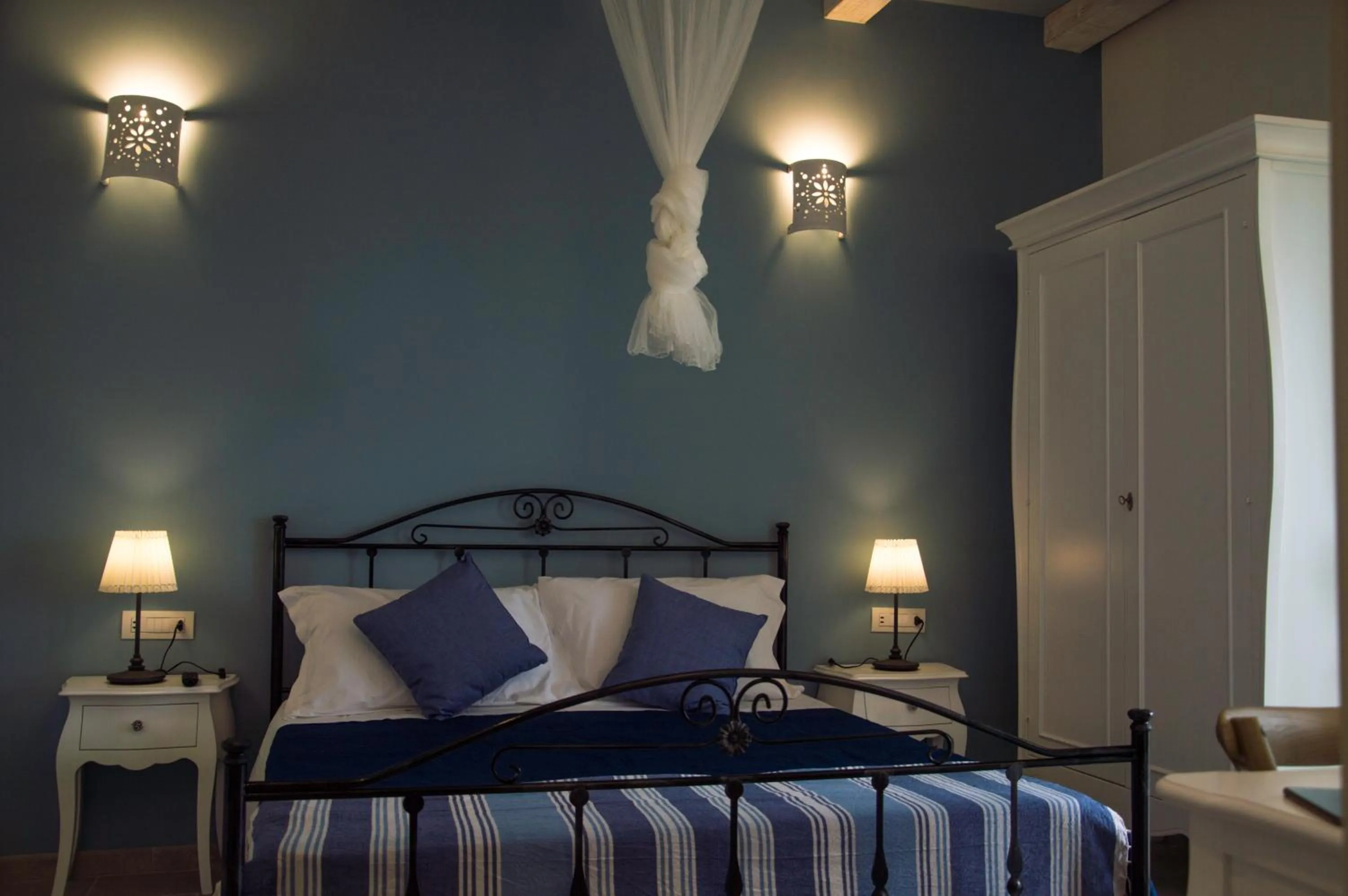 Bed in Villa de Lua Boutique Hotel