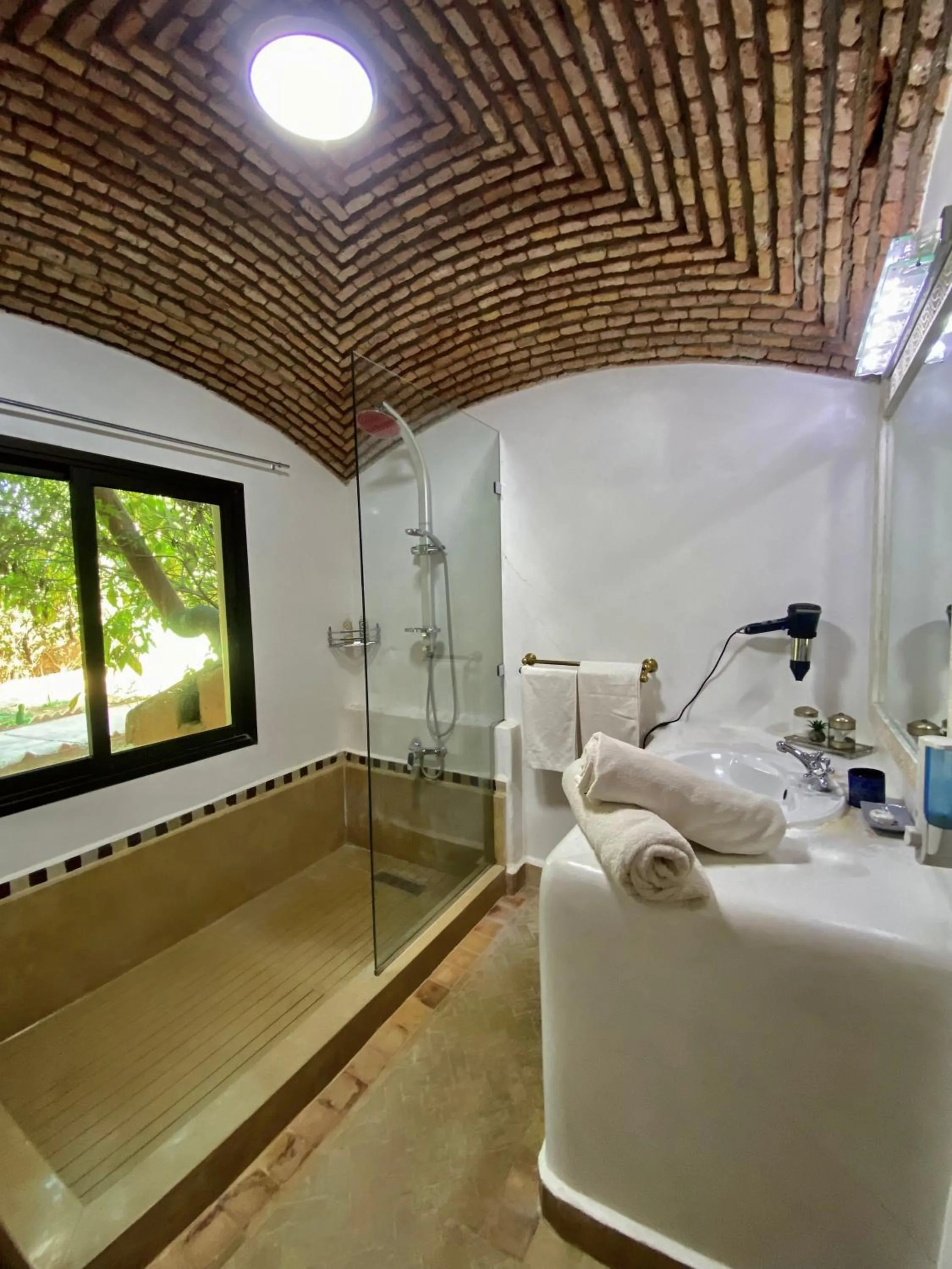 Shower in La Villa Des Golfs & PinkCactus