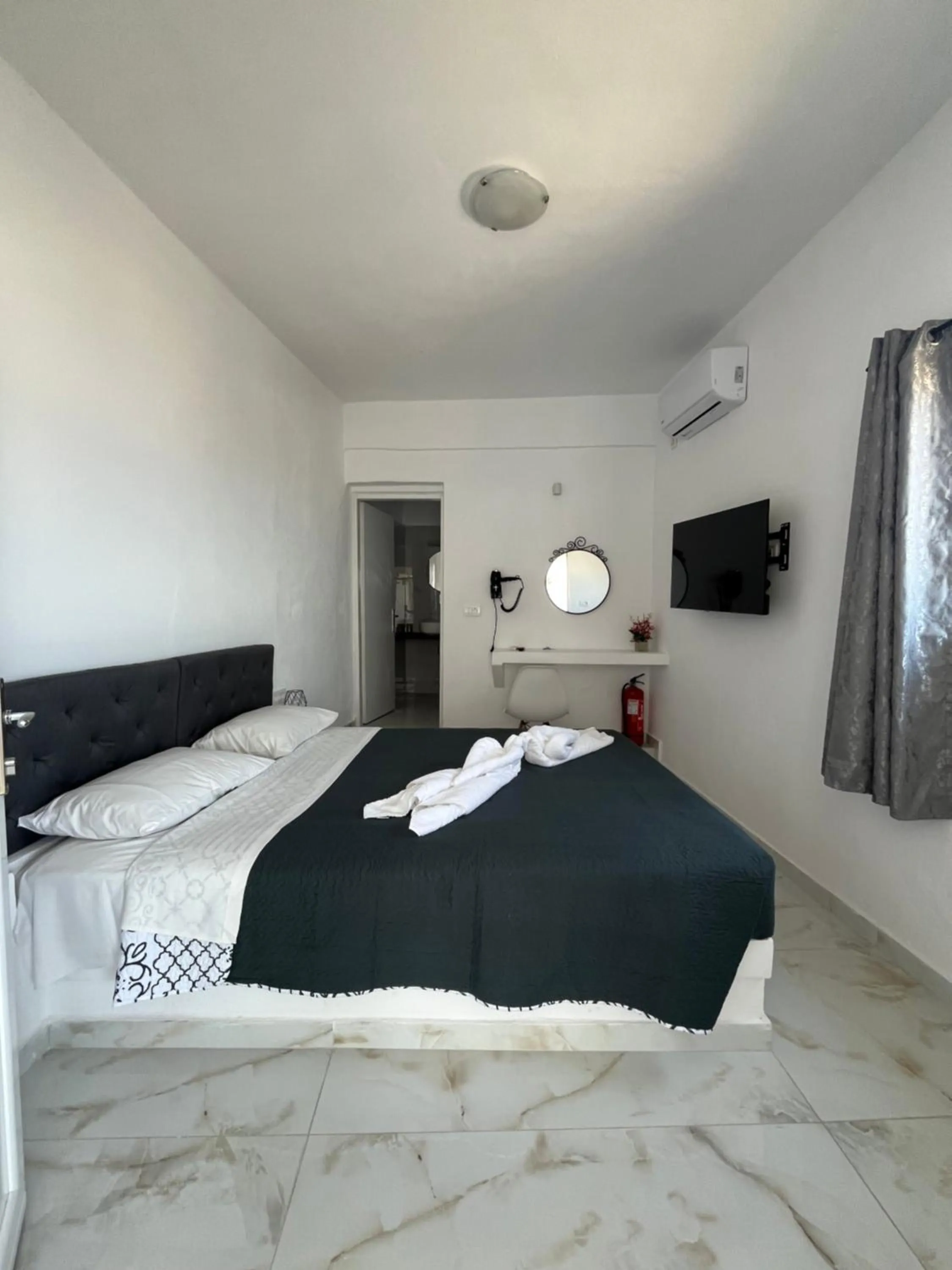 Bed in Stella Nomikou Apartments