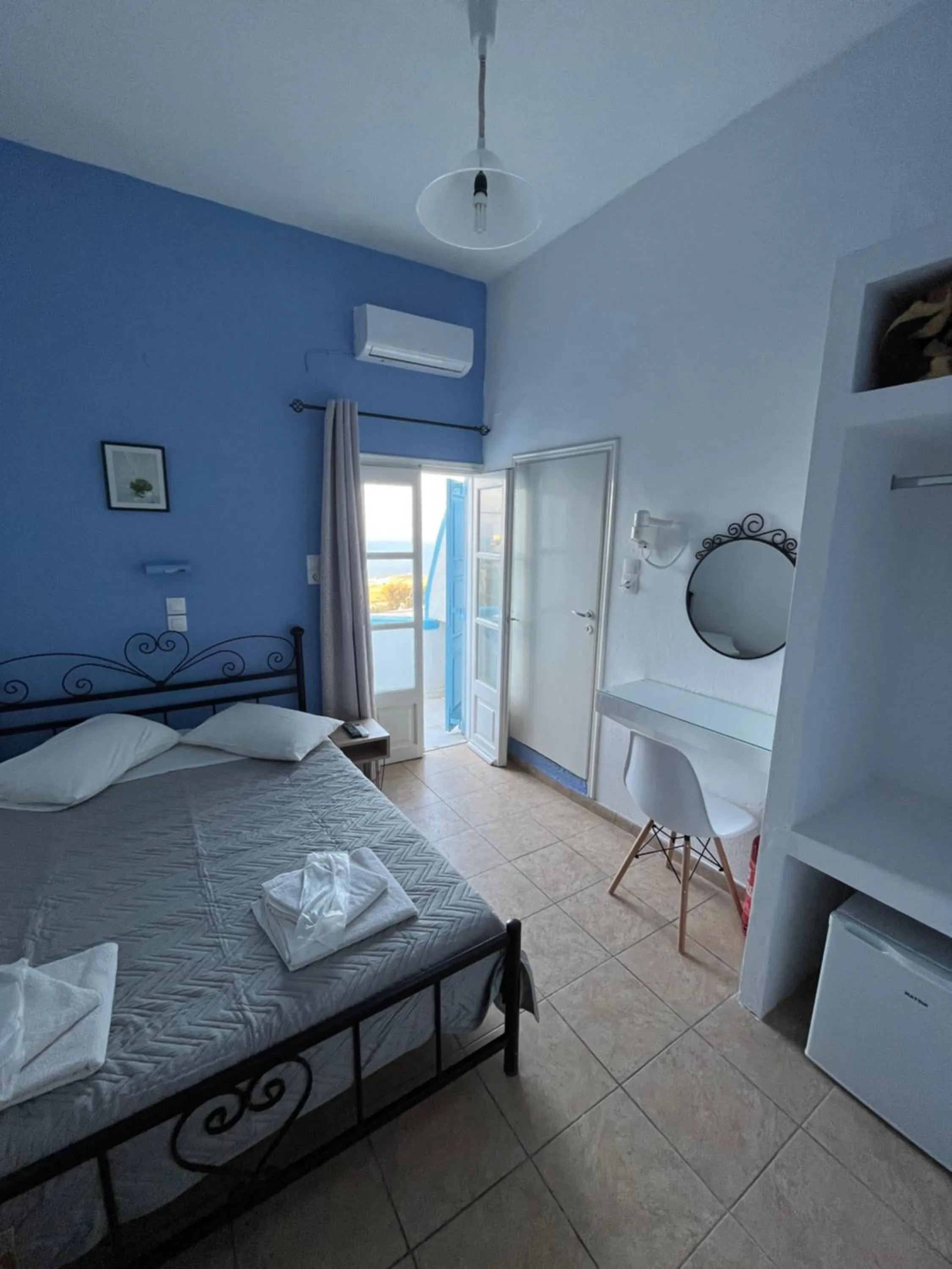 Bed in Stella Nomikou Apartments