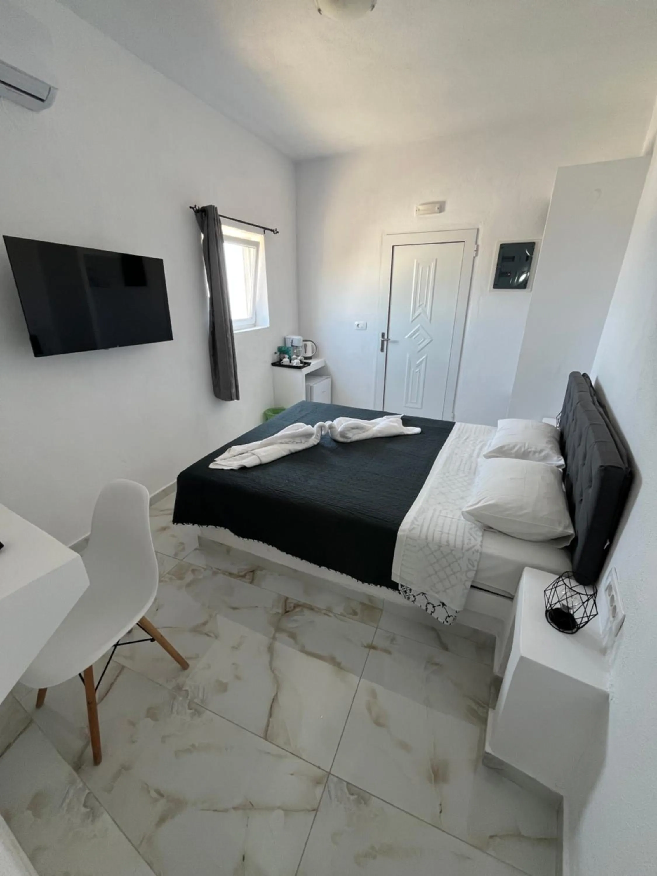 Bed in Stella Nomikou Apartments