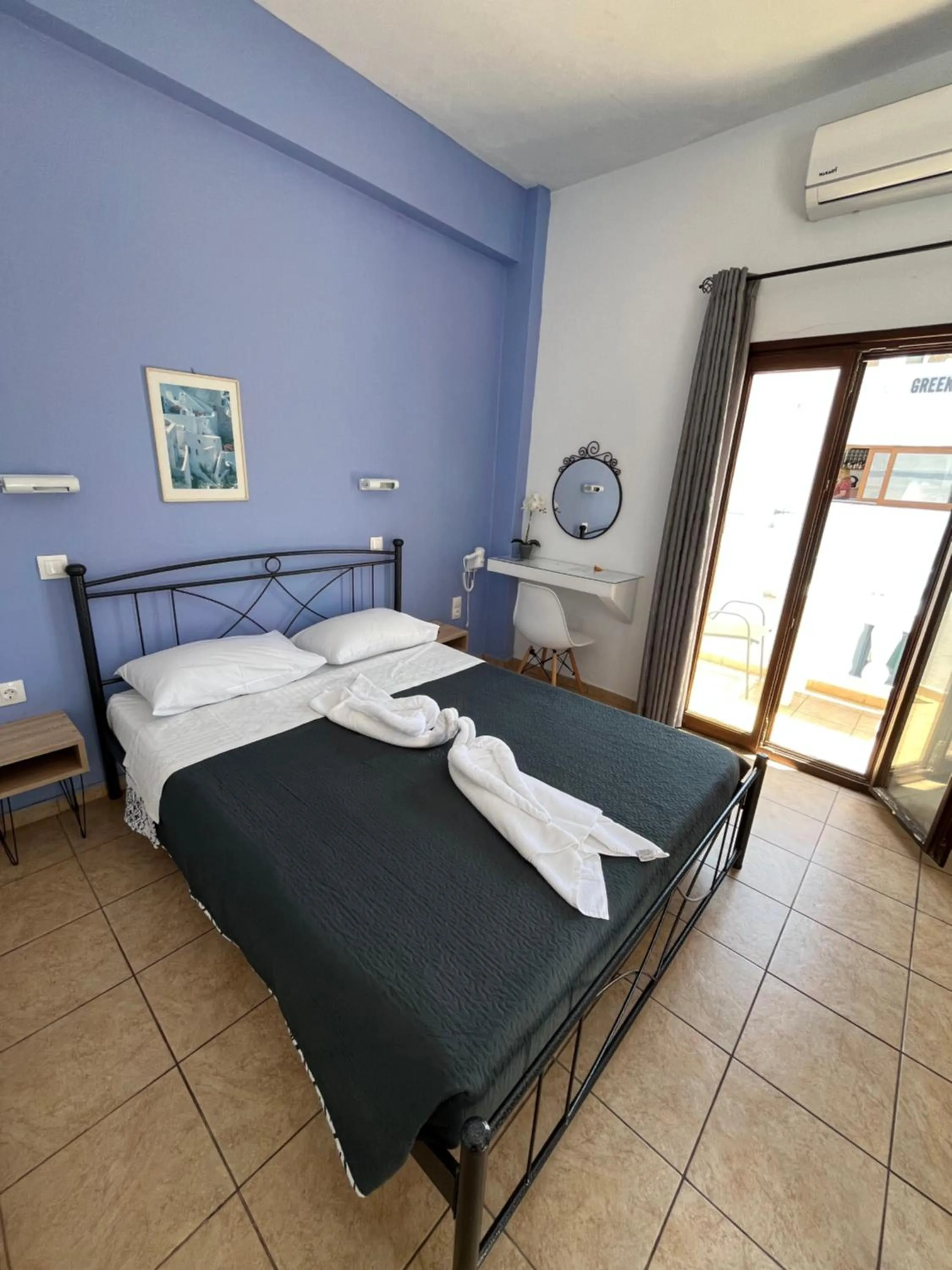 Bed in Stella Nomikou Apartments