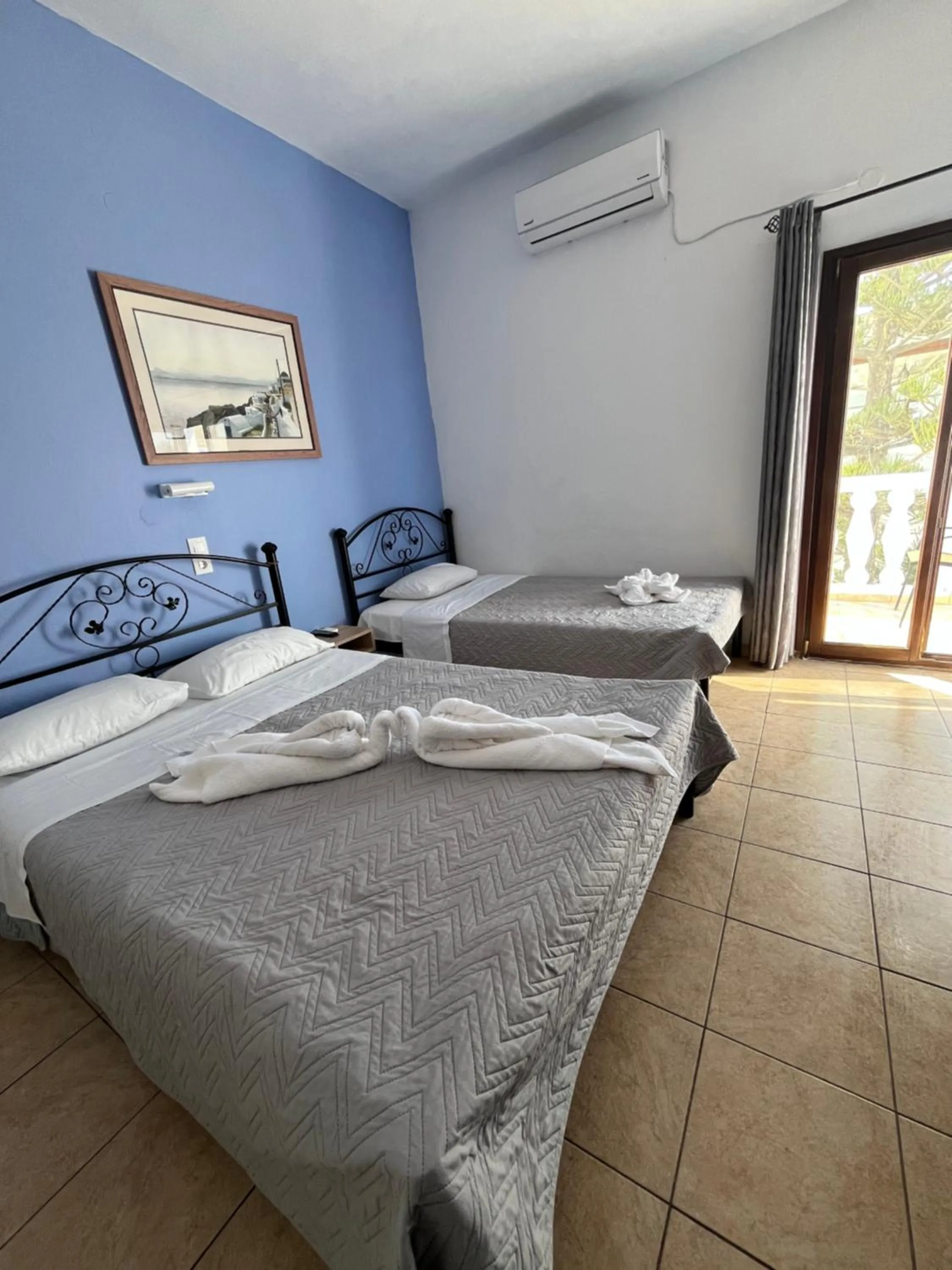 Bed in Stella Nomikou Apartments