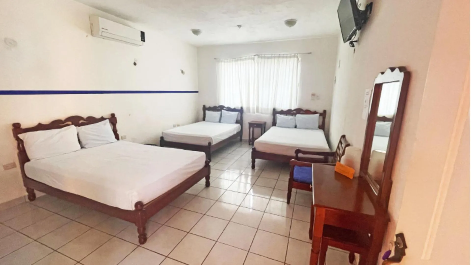 Bed in Hotel Hacienda Bacalar