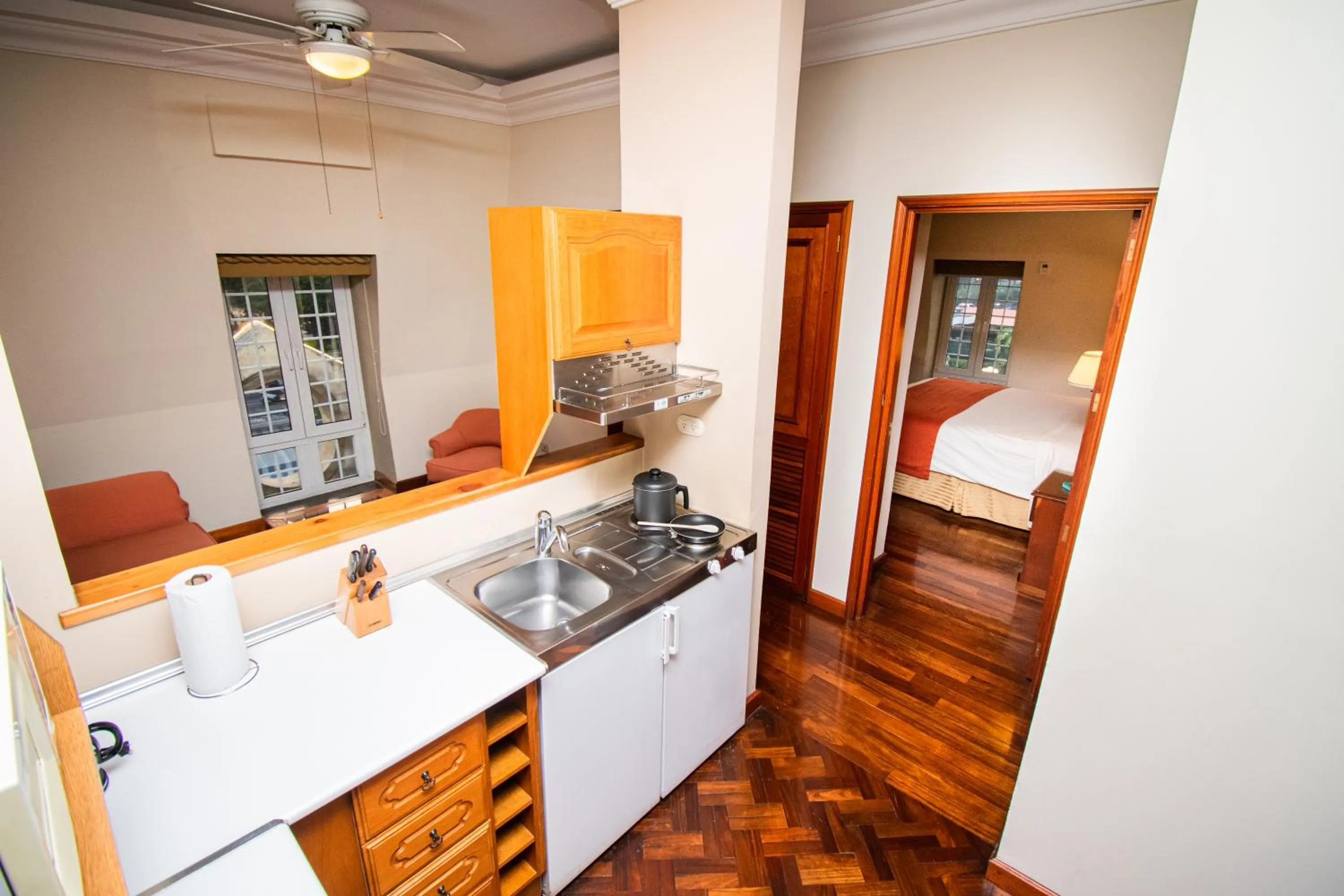 Kitchen or kitchenette, Bed in Hotel San Carlos