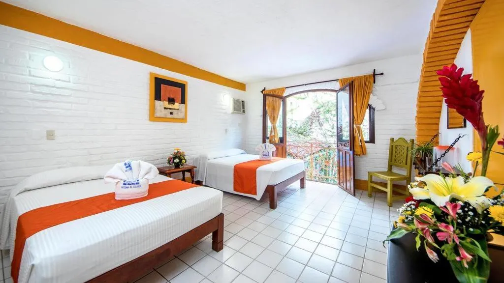 Bed in Hotel Hacienda de Vallarta Centro