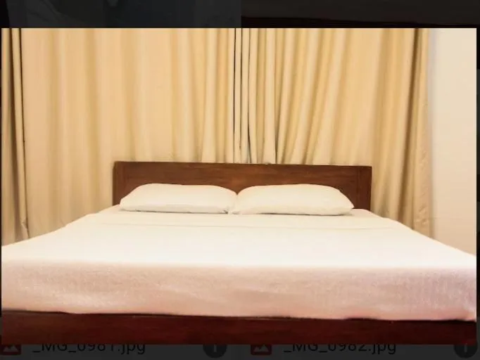 Bed in Balay 8 Suites