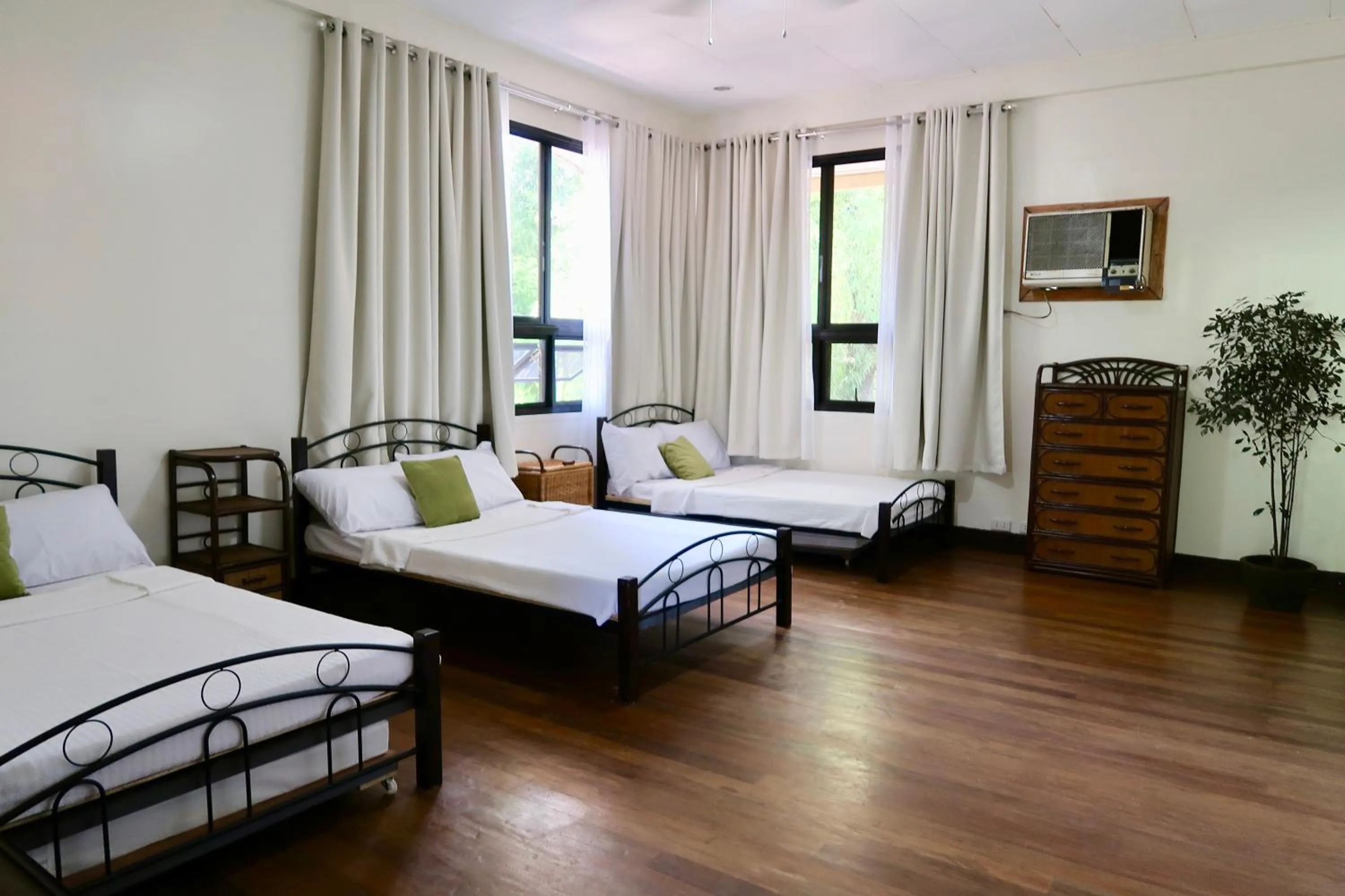 Bed in Balay 8 Suites