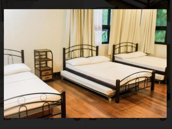 Bed in Balay 8 Suites