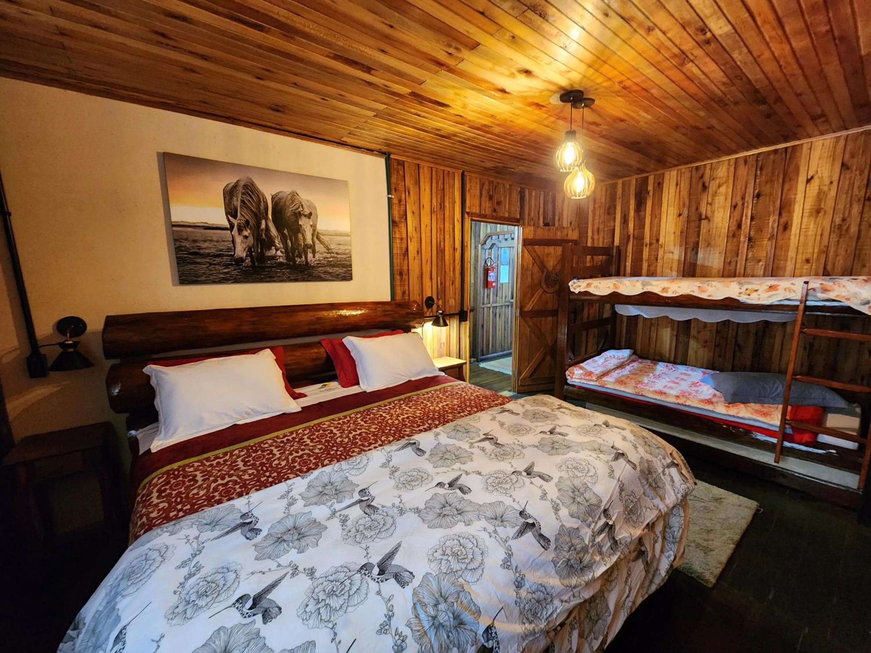 Bed in Pousada Recanto dos Pôneis Rio Rufino Urubici