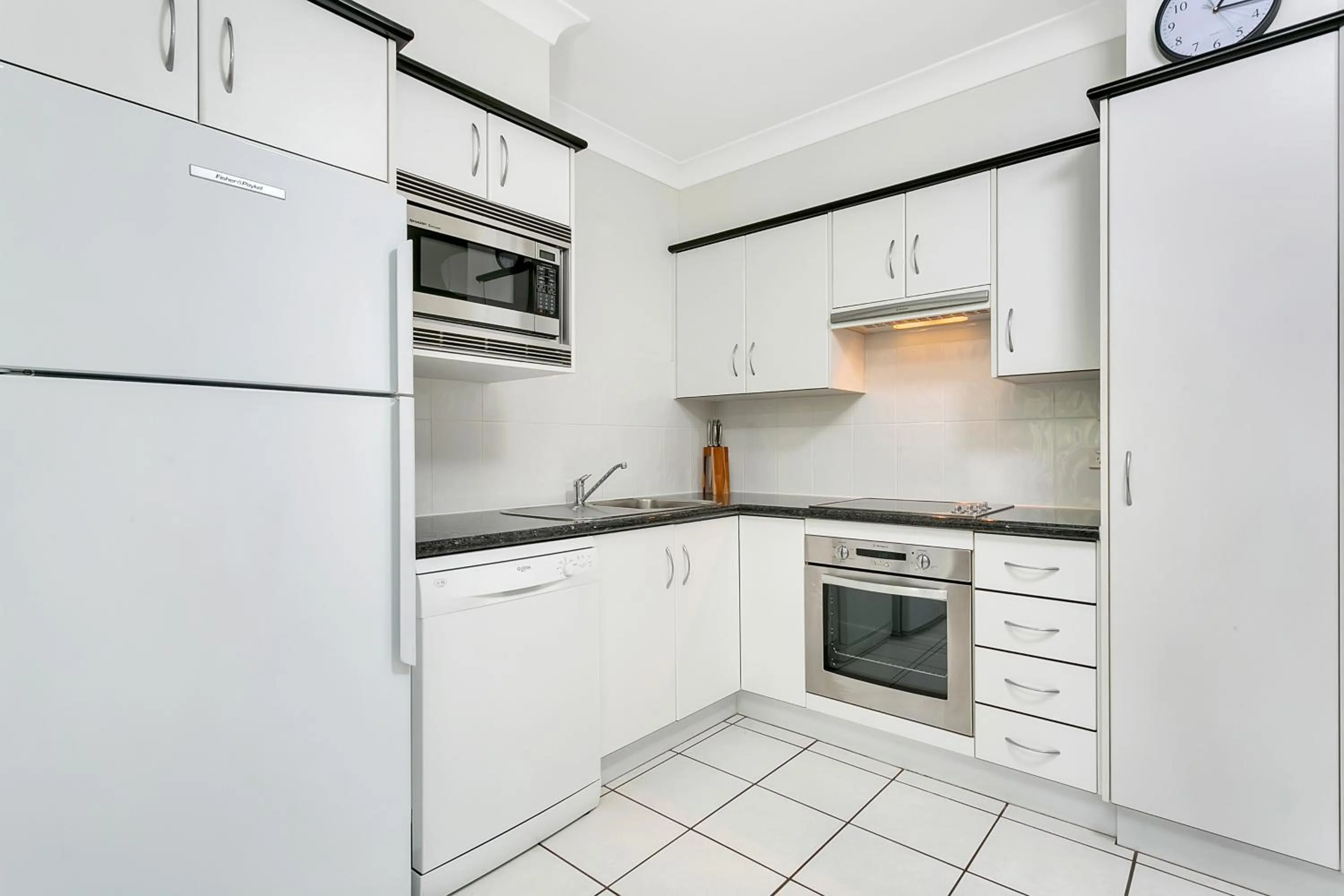 Kitchen or kitchenette in Beachfront Apartments on Trinity Beach