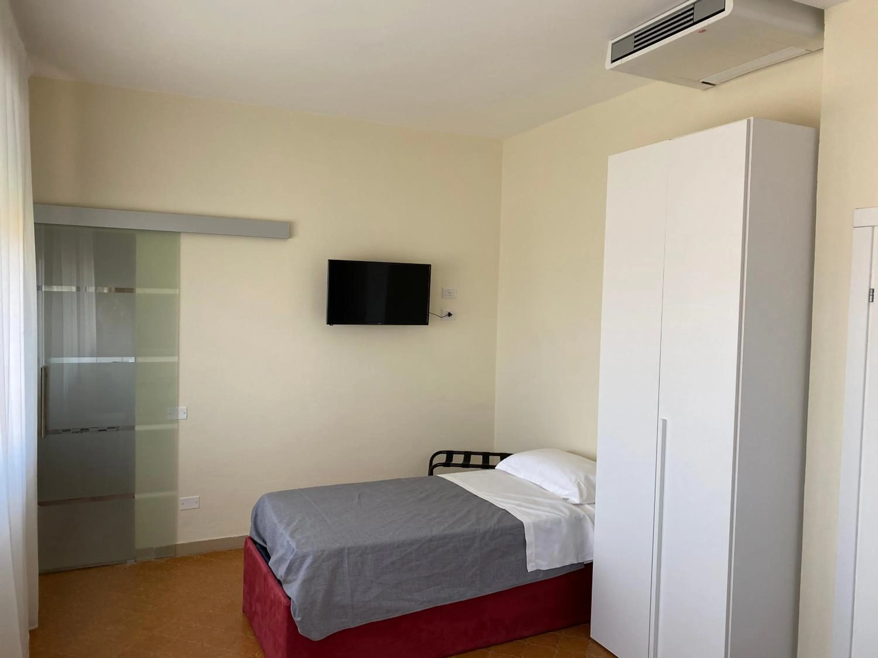 Bed in Acquaviva Experience B&B