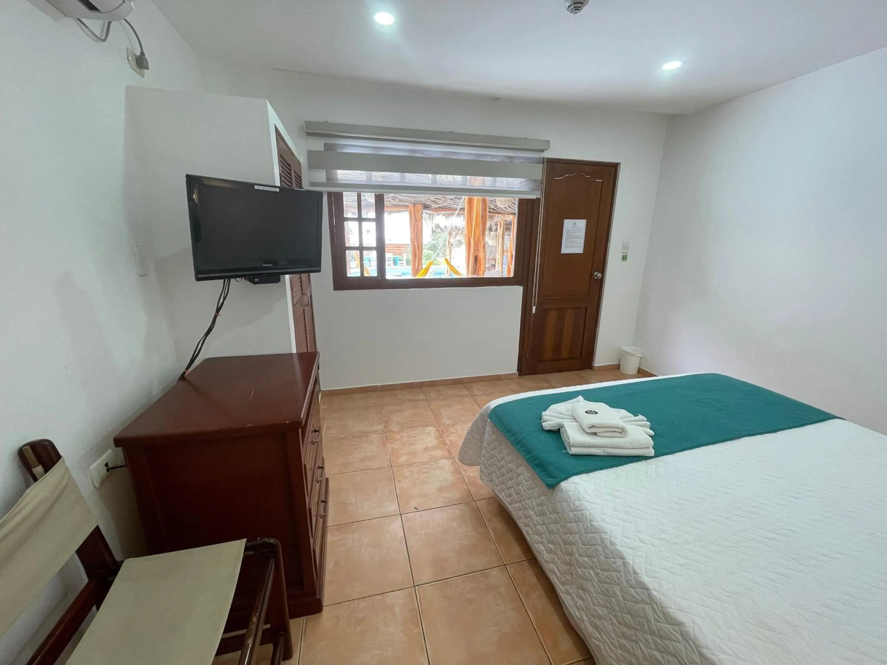 Bed in Hosteria Punta Blanca