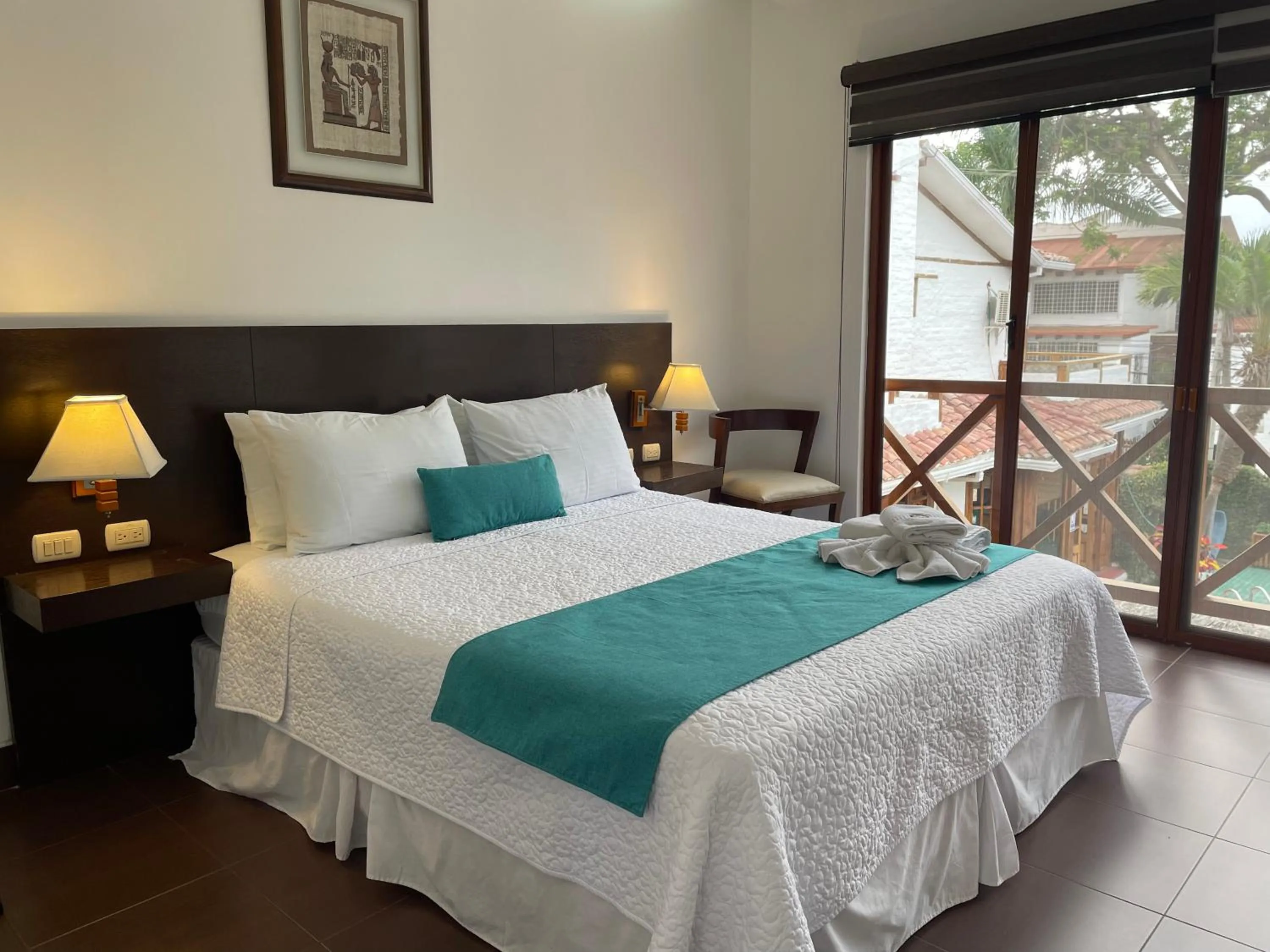 Photo of the whole room, Bed in Hosteria Punta Blanca