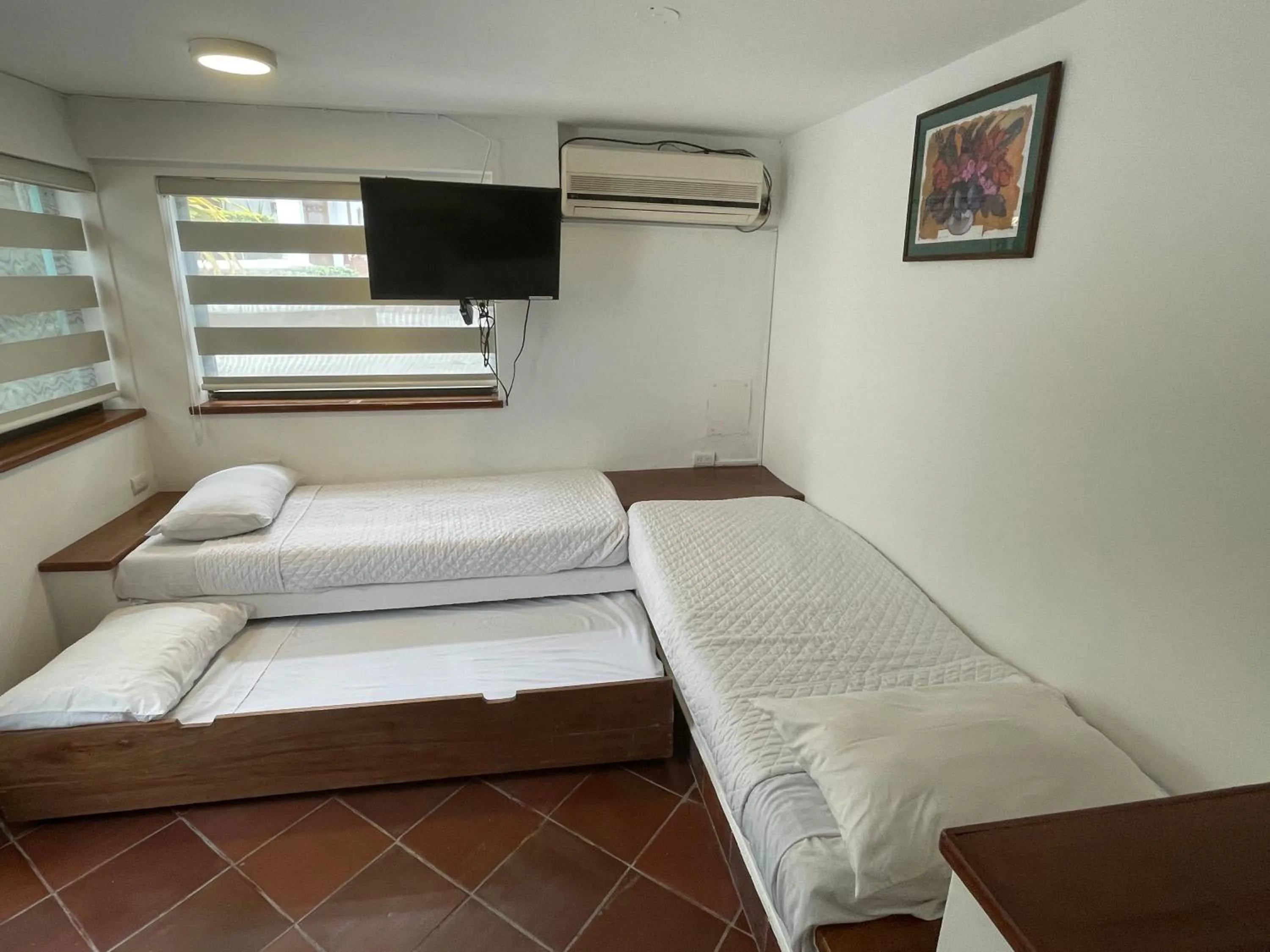 Bed in Hosteria Punta Blanca