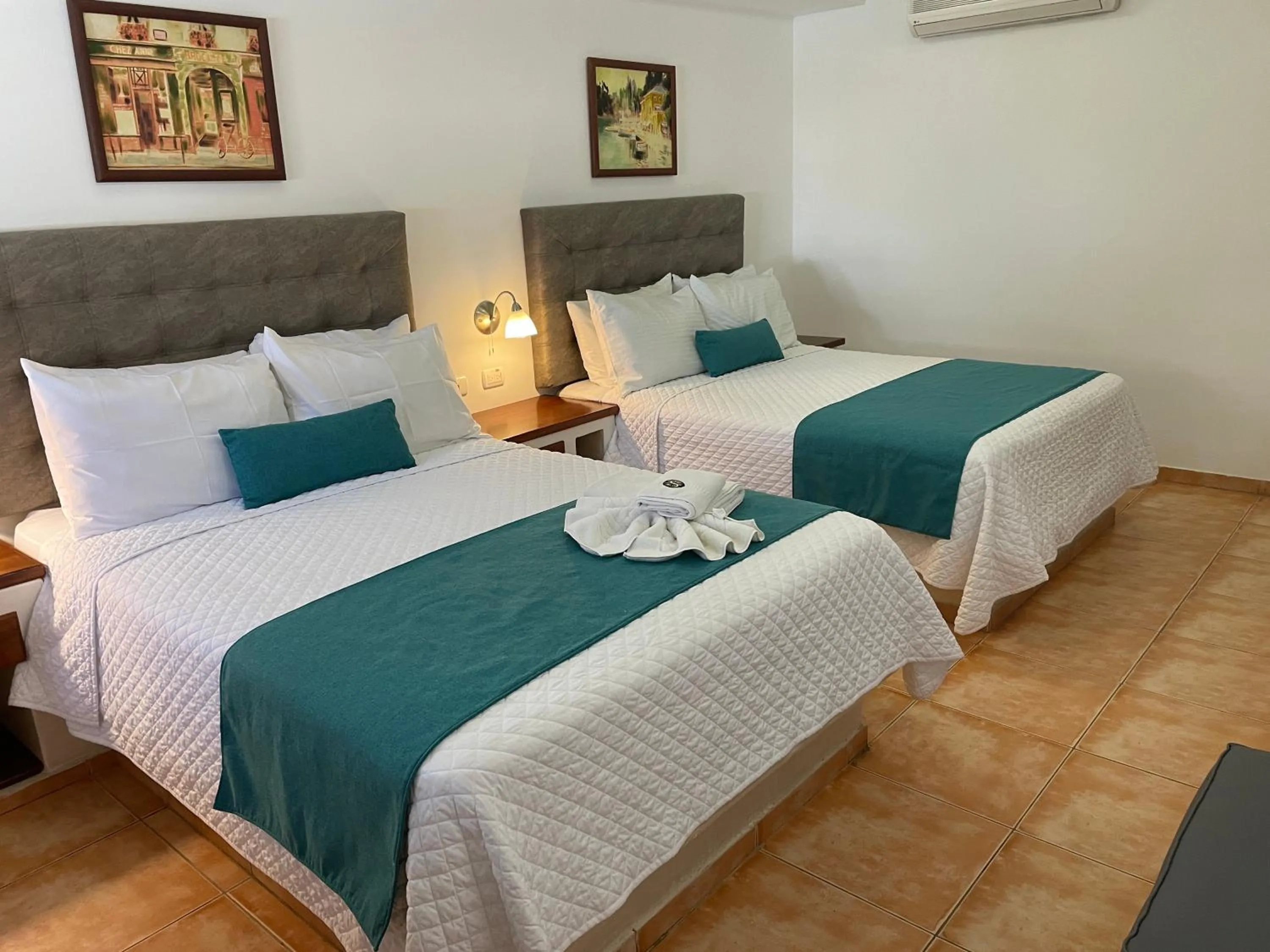 Bed in Hosteria Punta Blanca