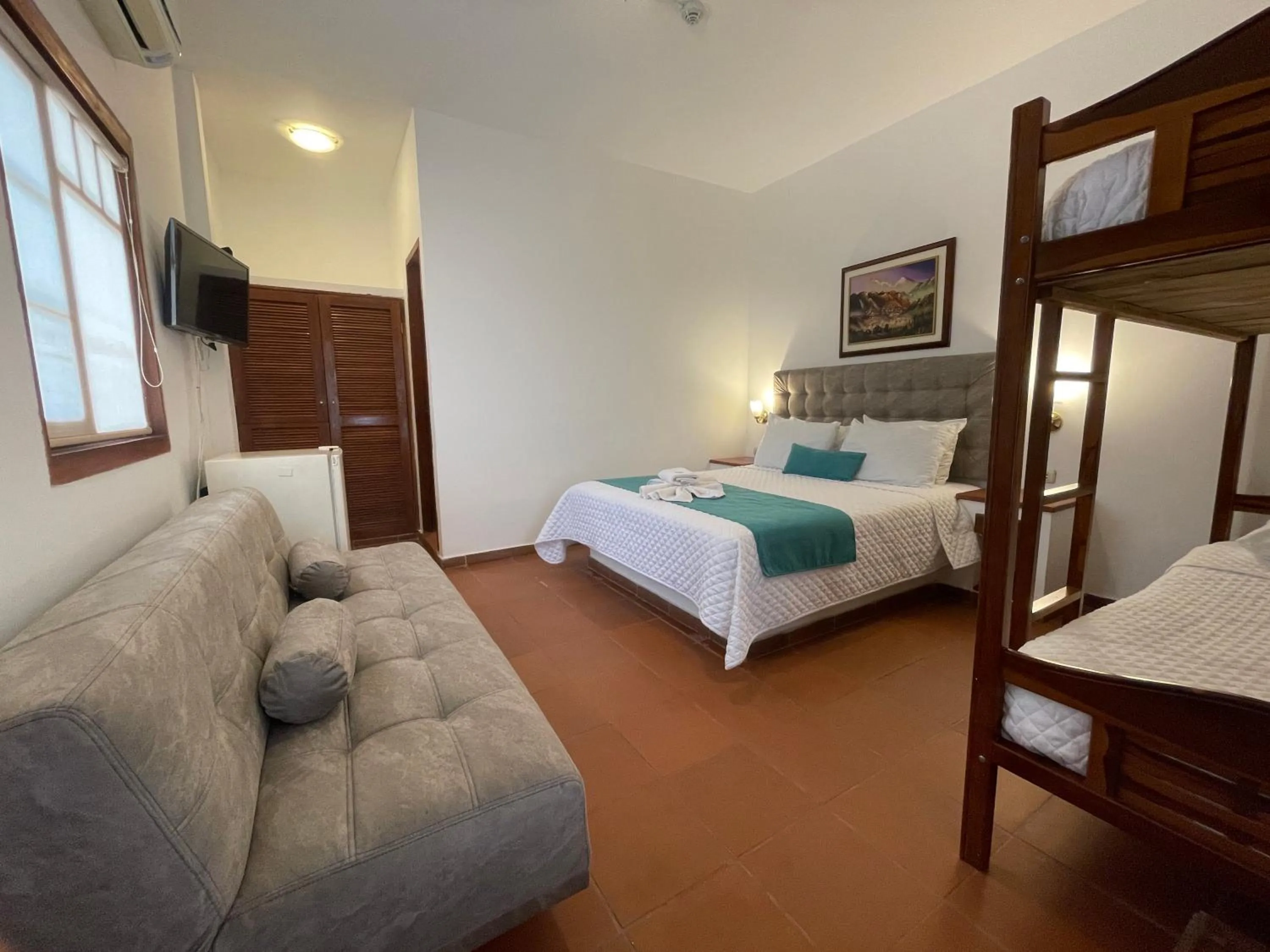 Photo of the whole room, Bed in Hosteria Punta Blanca