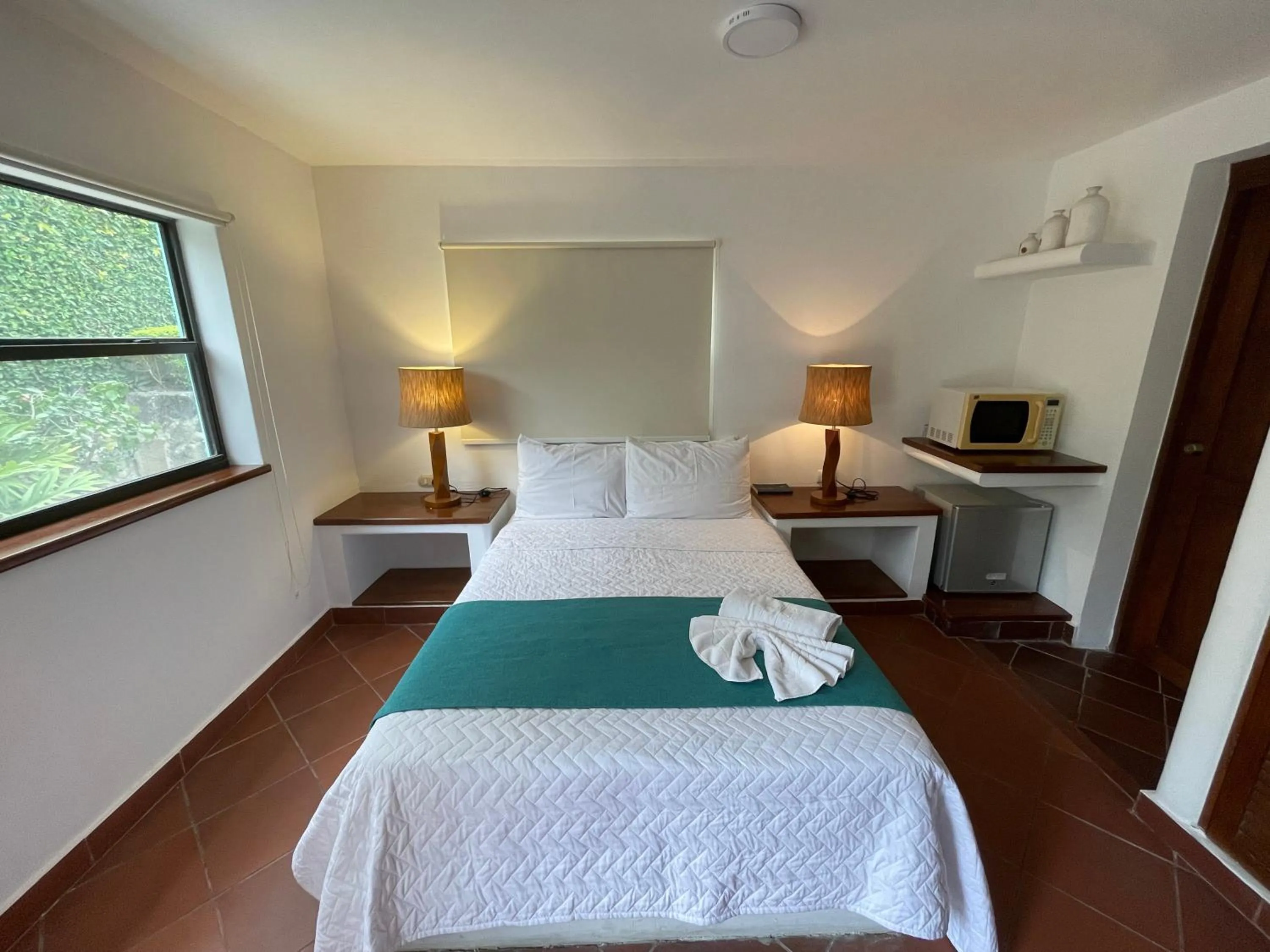 Bed in Hosteria Punta Blanca