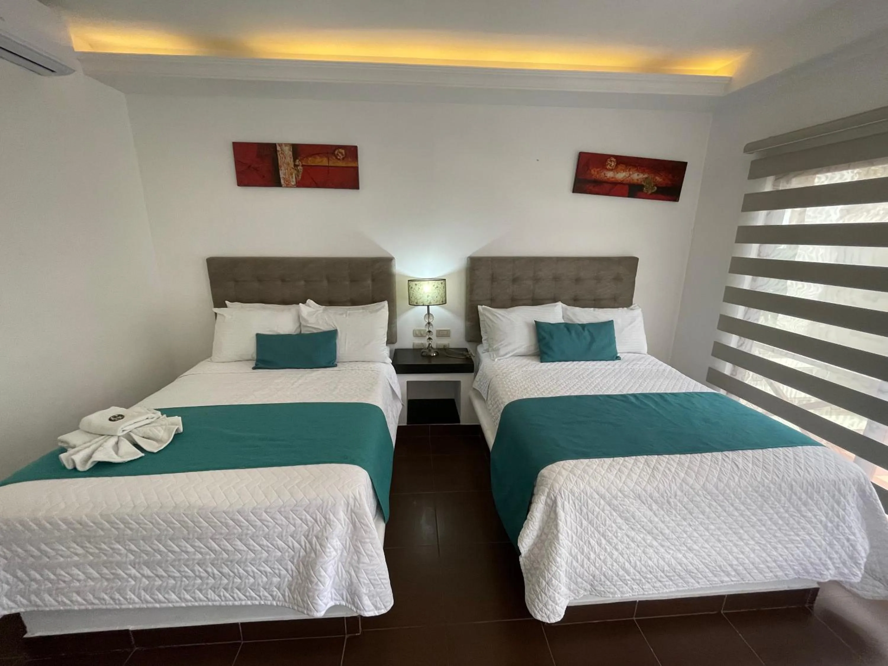 Bed in Hosteria Punta Blanca