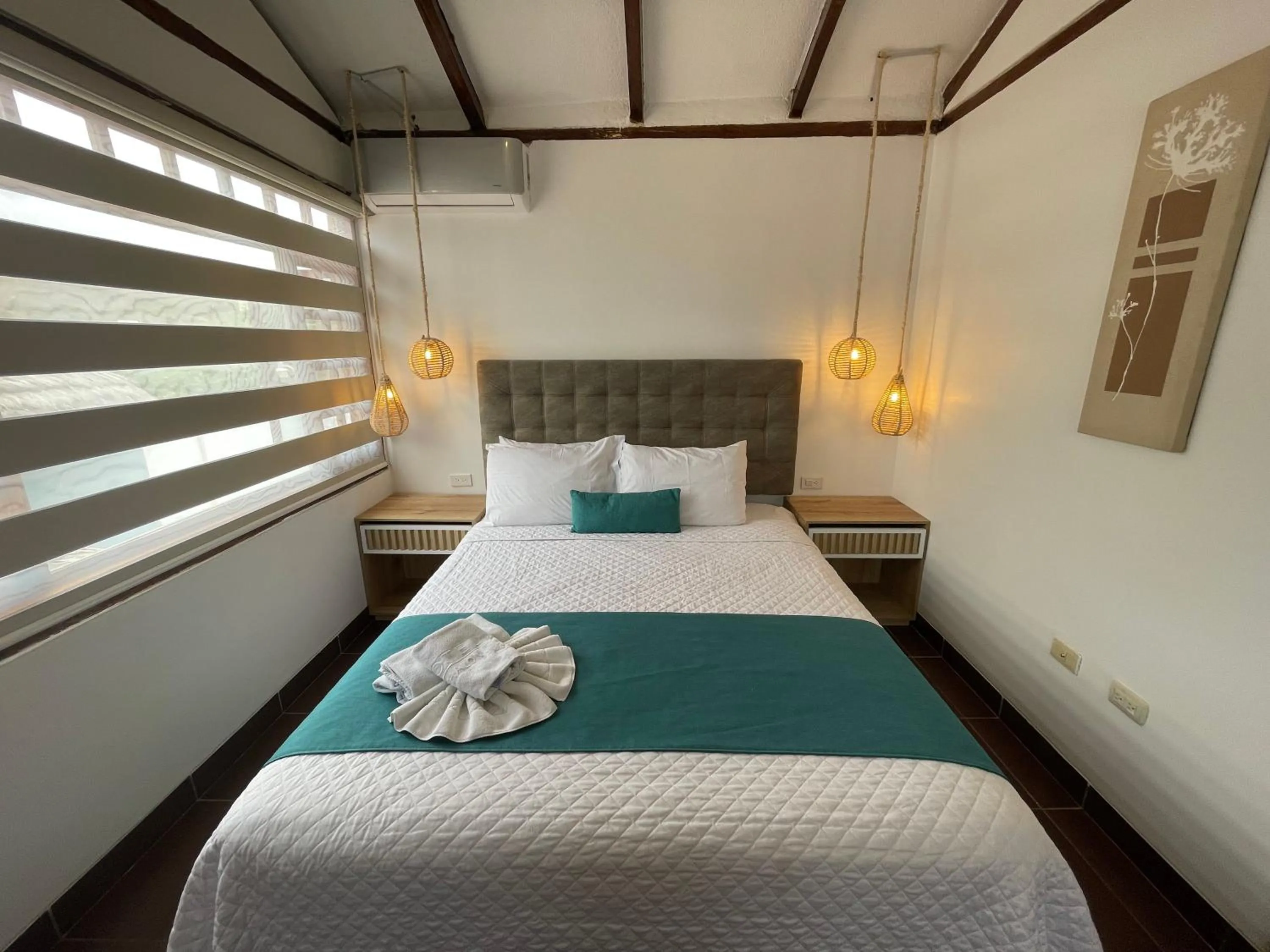 Bed in Hosteria Punta Blanca
