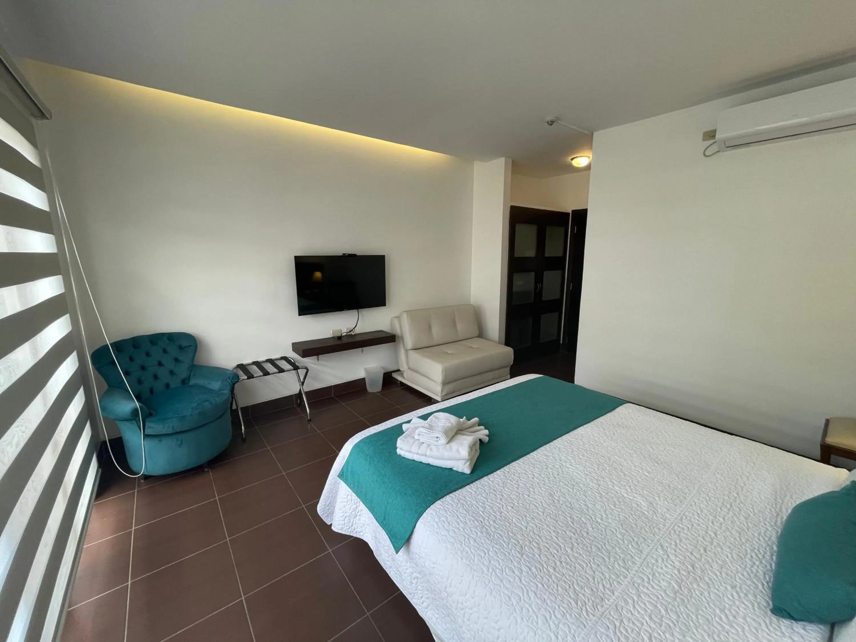 Bed in Hosteria Punta Blanca