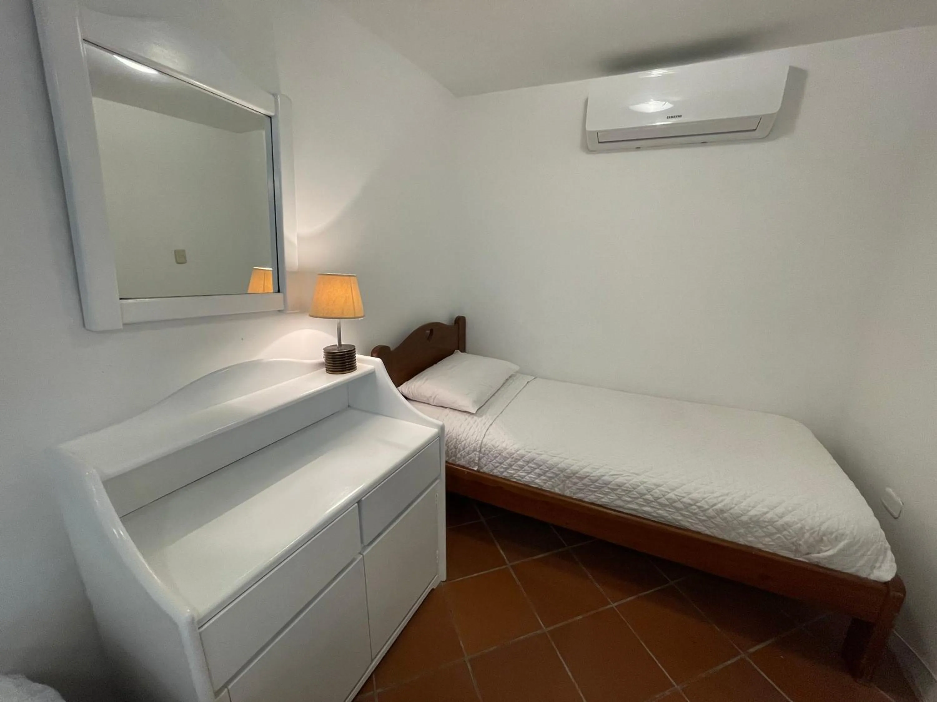 Bed in Hosteria Punta Blanca