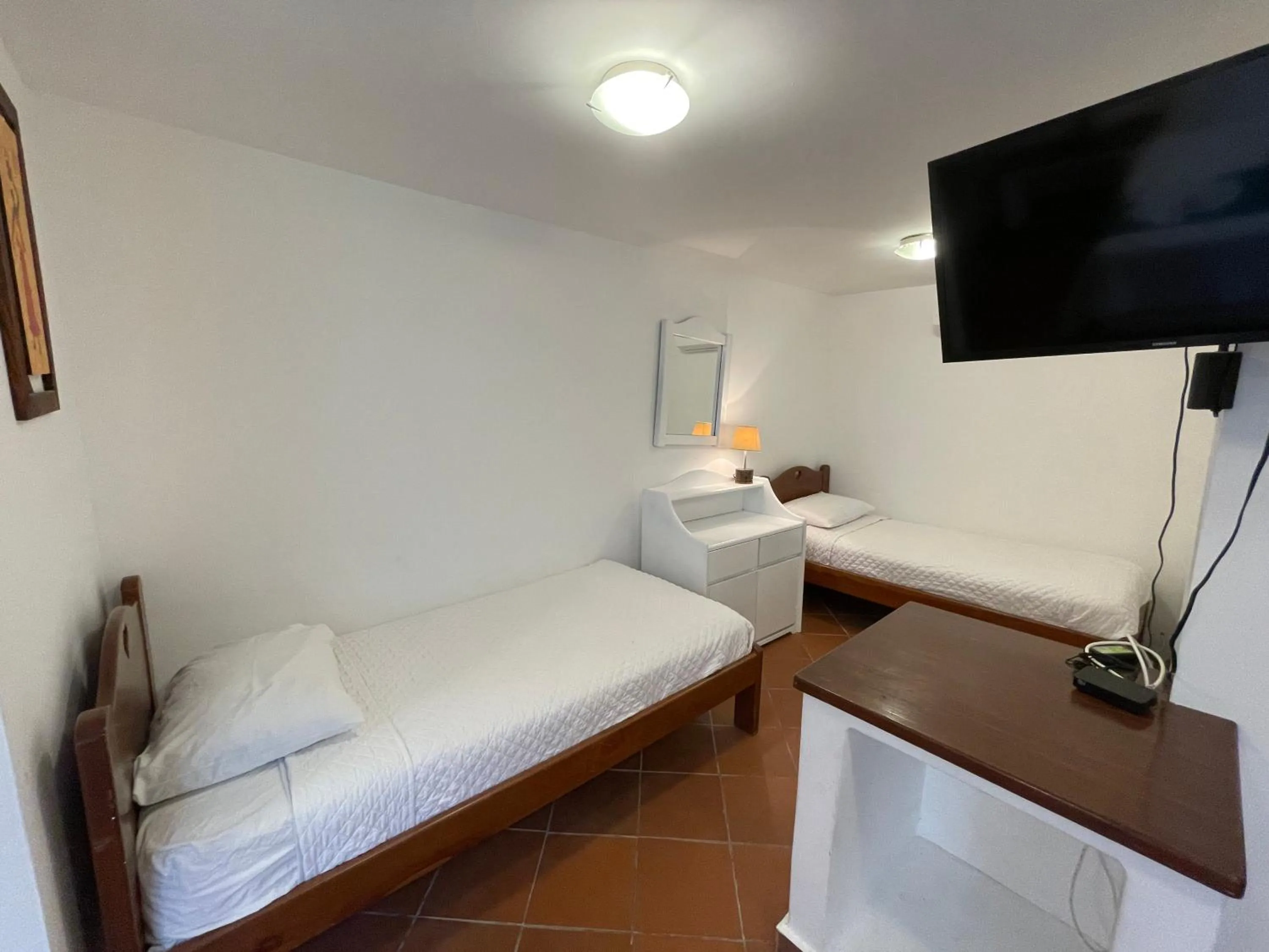 Bed in Hosteria Punta Blanca