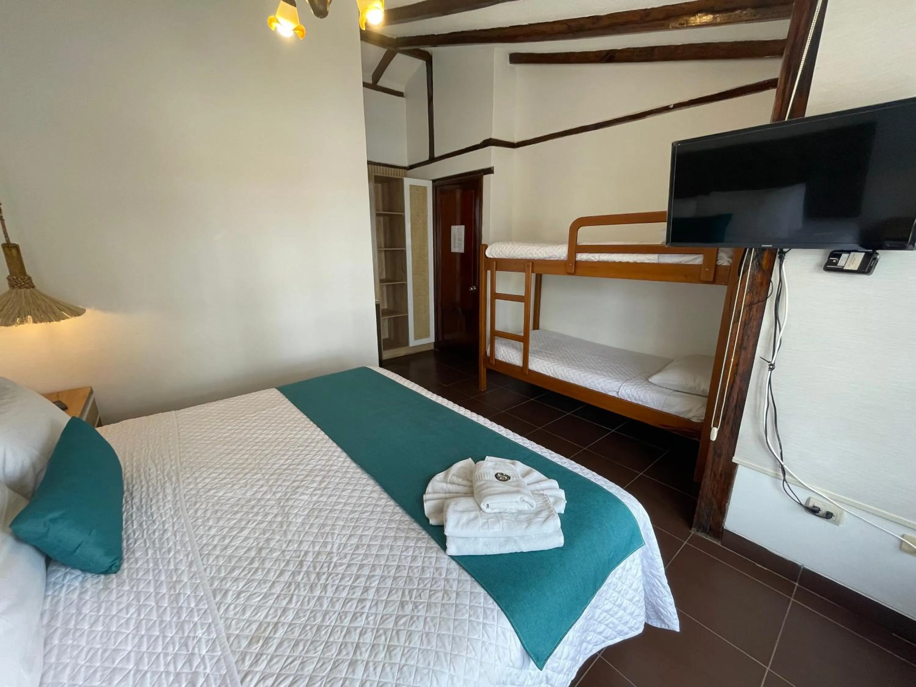 Bed in Hosteria Punta Blanca