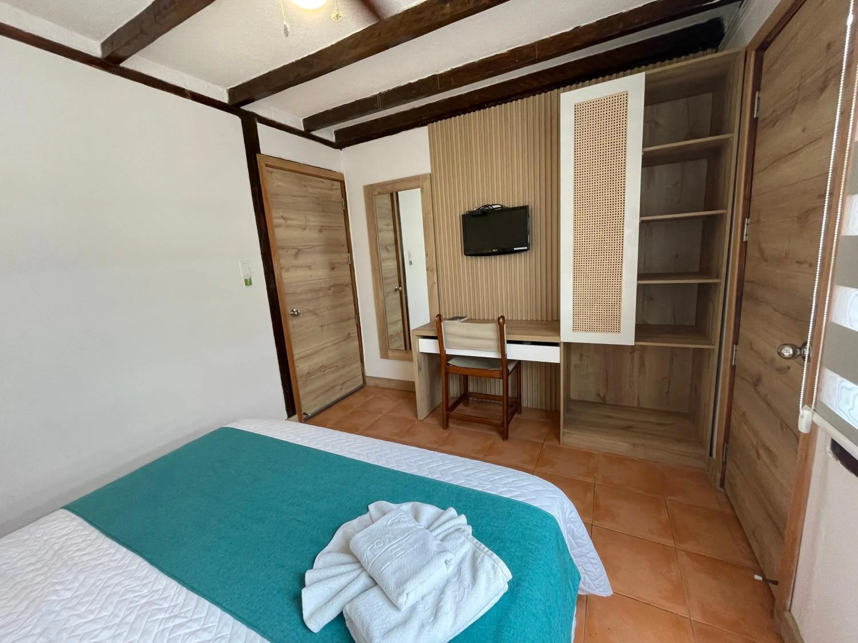 Bed in Hosteria Punta Blanca