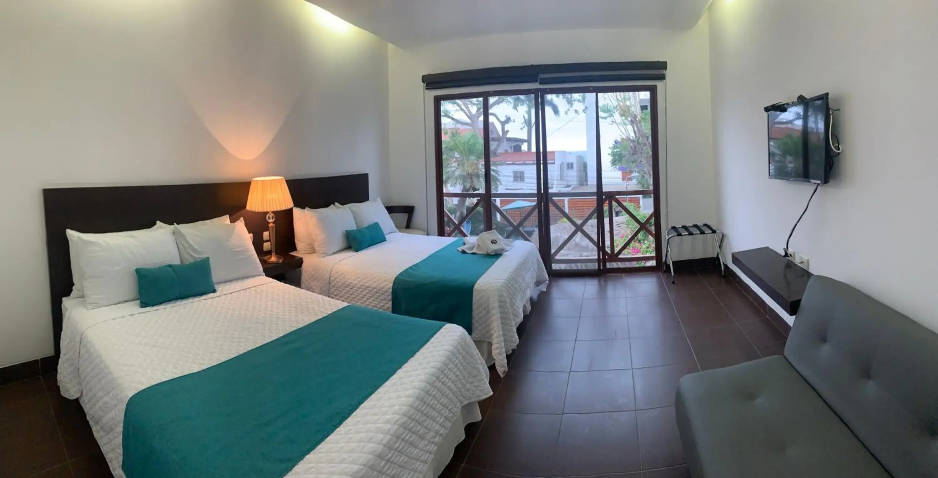 Deluxe Quadruple Room in Hosteria Punta Blanca Deluxe Quadruple Room in Hosteria Punta Blanca