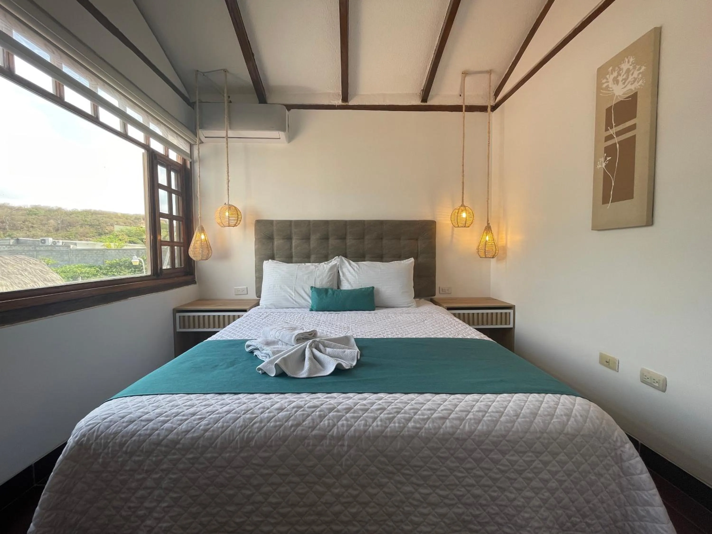 Bed in Hosteria Punta Blanca