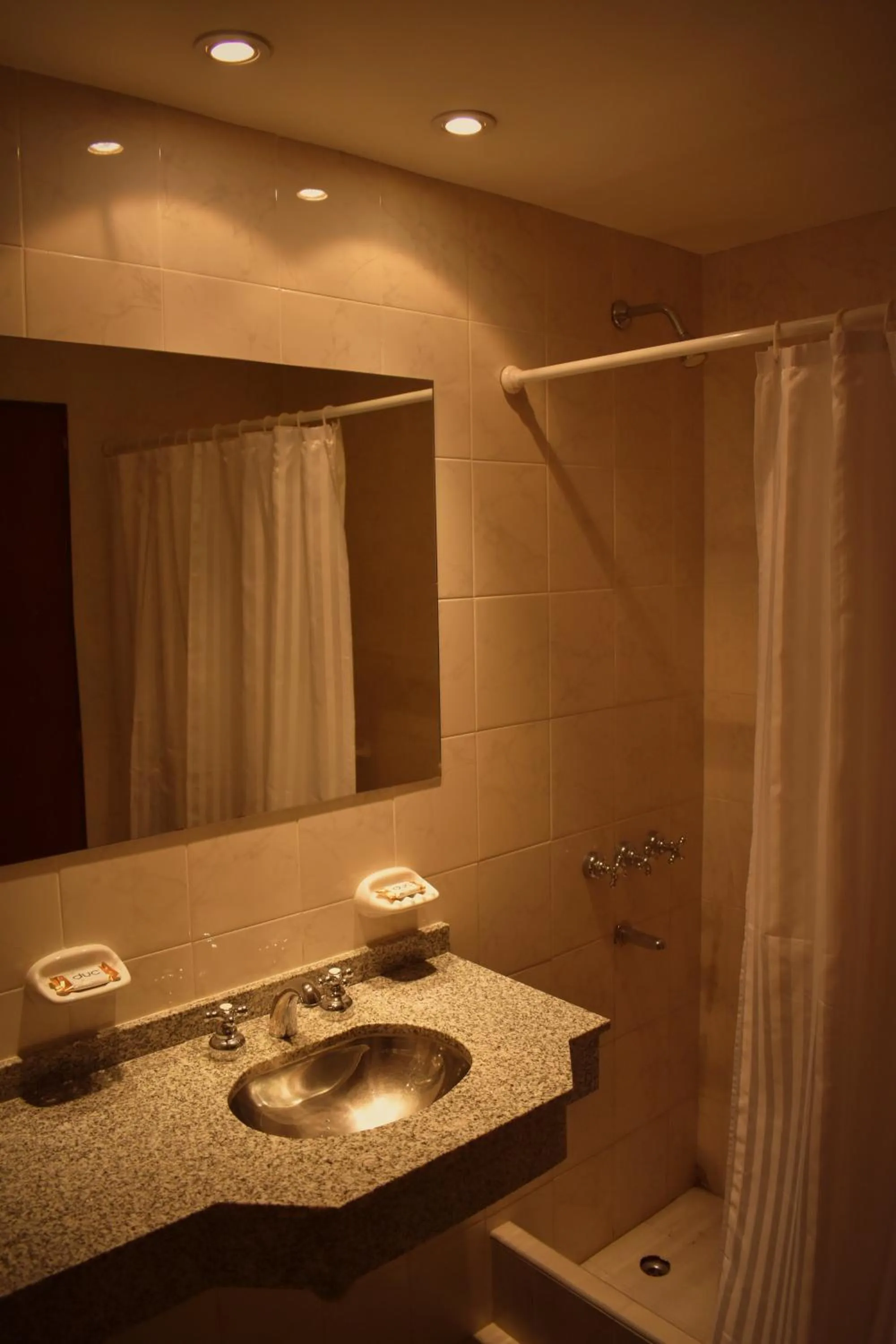 Bathroom in Villa de Merlo All Inclusive & Spa by MH