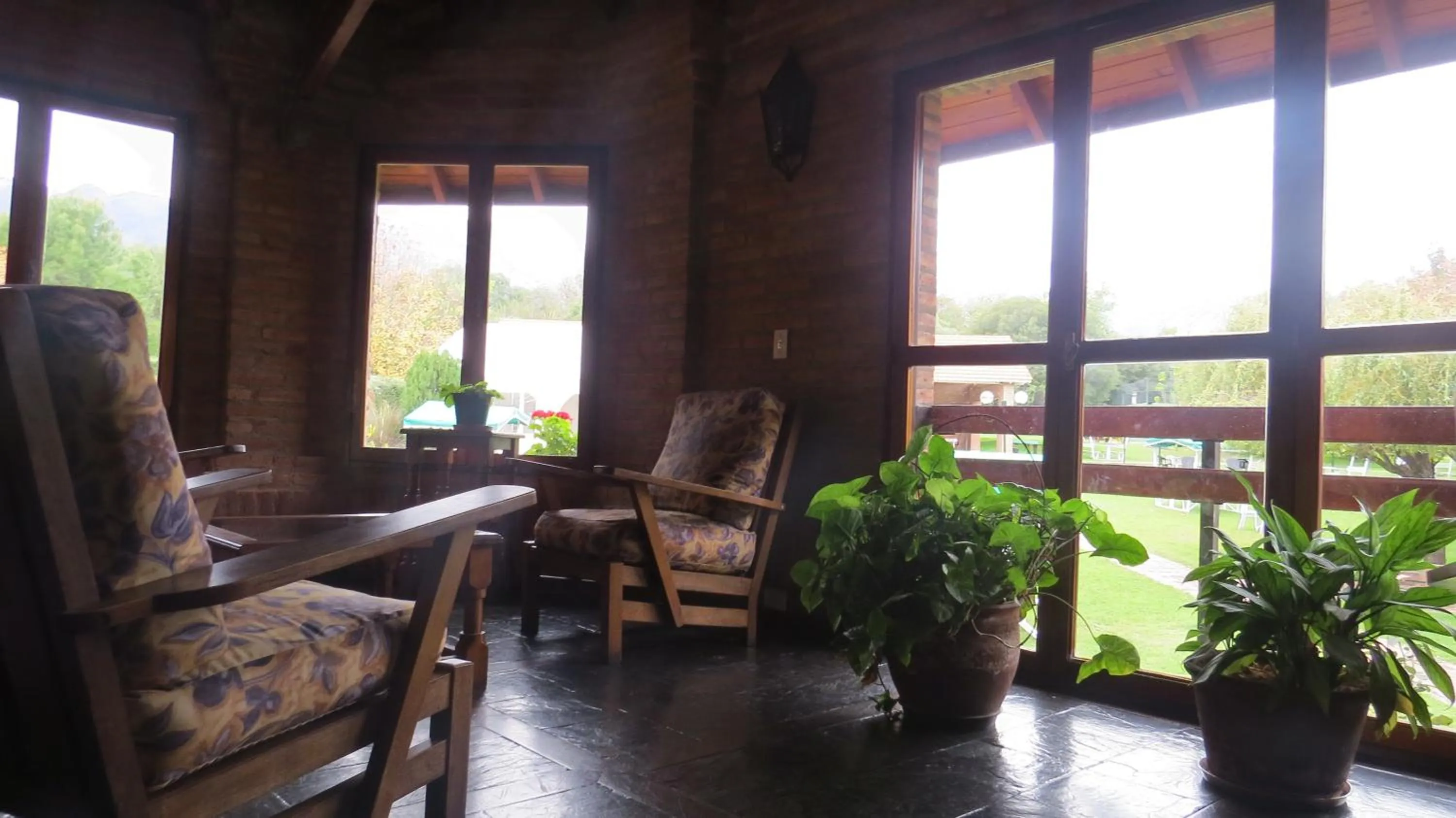 Communal lounge/ TV room in Villa de Merlo All Inclusive & Spa by MH