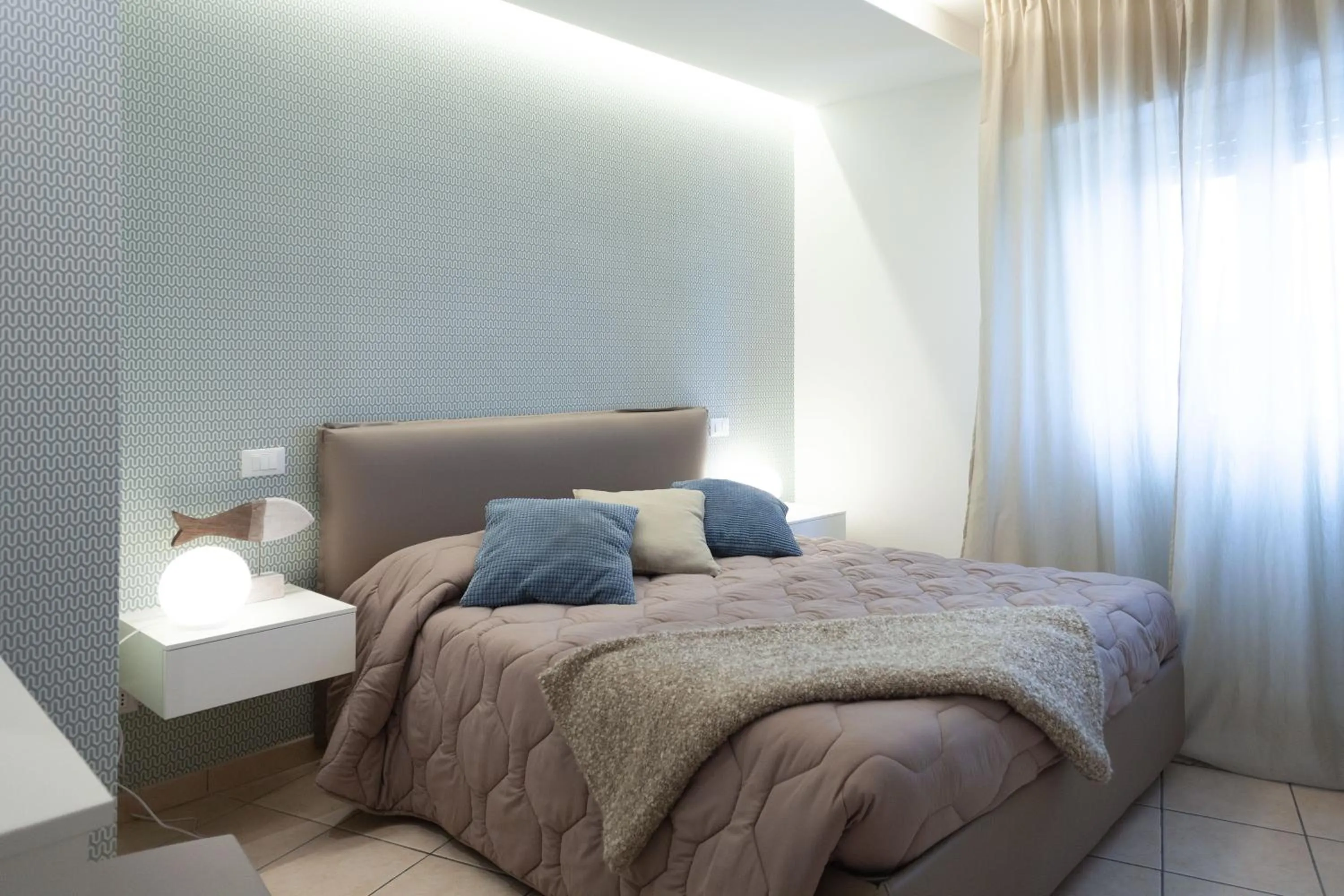 Decorative detail, Bed in Residenza Alma