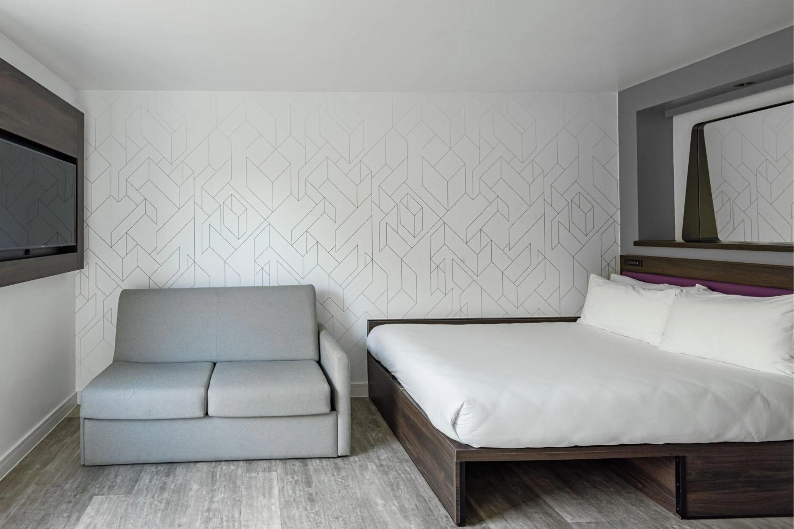 Photo of the whole room, Bed in YOTEL London Shoreditch