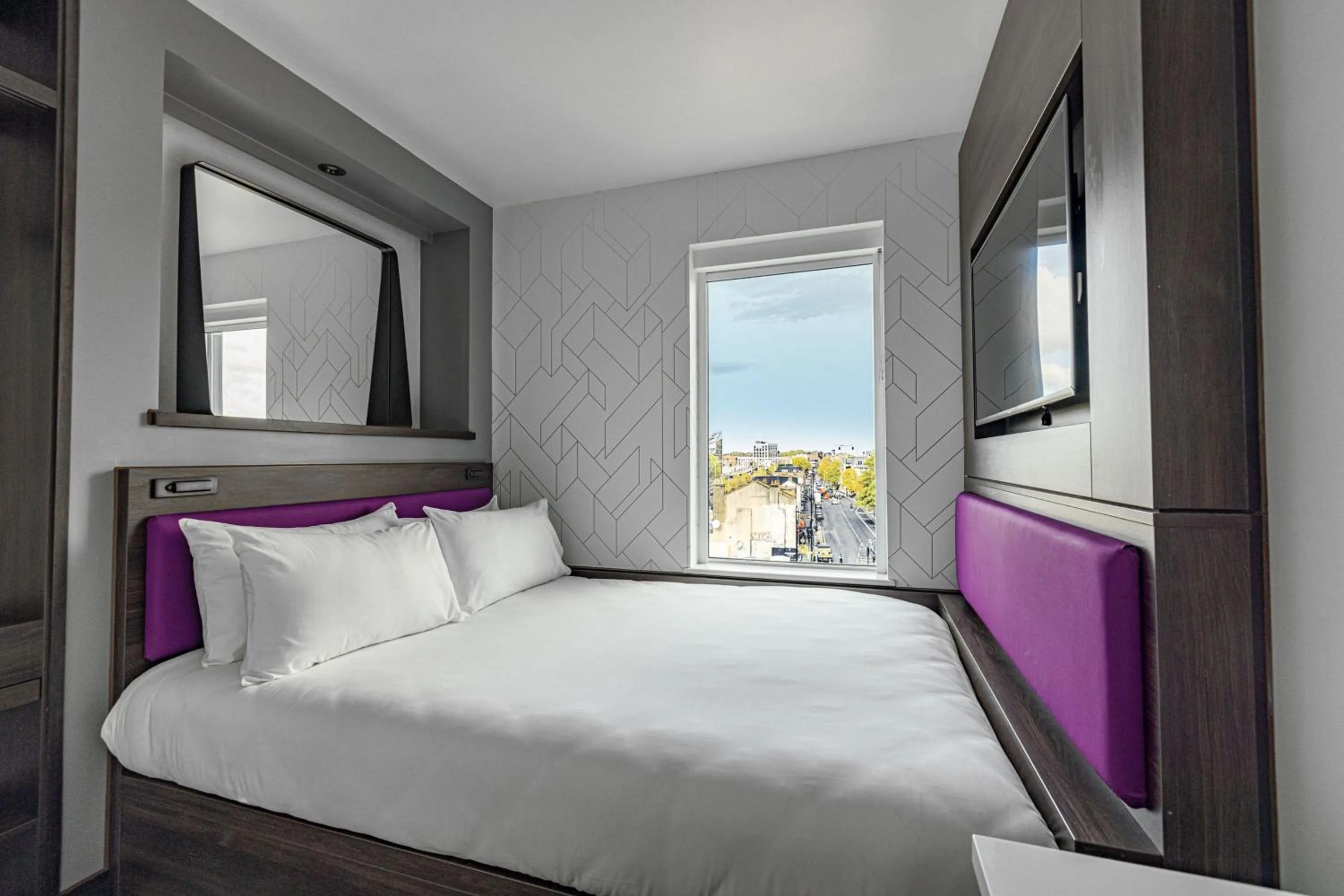 Photo of the whole room, Bed in YOTEL London Shoreditch
