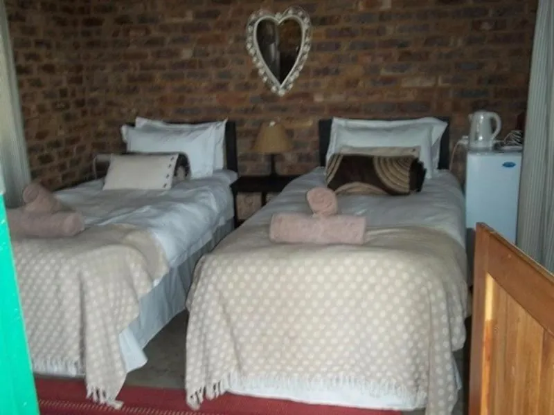 Bed in Tranquillity Day Spa & Lodge