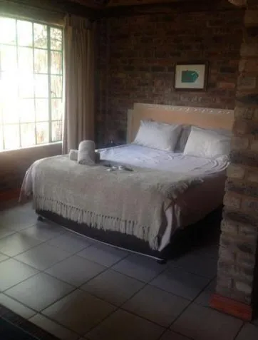 Bed in Tranquillity Day Spa & Lodge